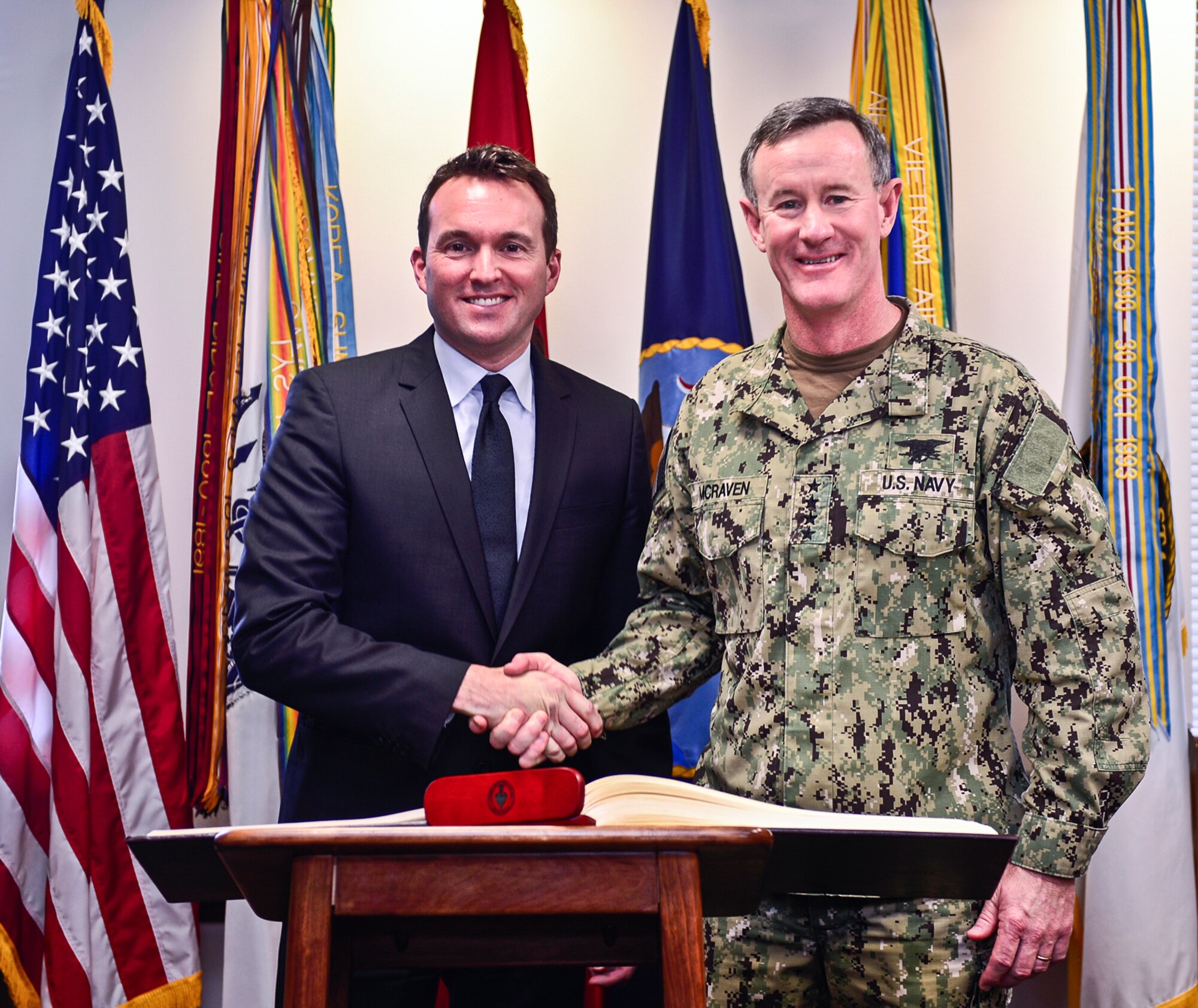 Navy Adm. Bill McRaven, commander of the U.S. Special Operations Command, greets Acting Secretary of the Air Force Eric Fanning during his visit to U.S. Special Operations Command headquarters, Aug 29, 2013 at MacDill Air Force Base, Fla. Fanning visited MacDill to speak with Airmen, advocate their concerns and explain future force objectives. (U.S. Air Force photo by Tech. Sgt. Angelita Lawrence/Released)