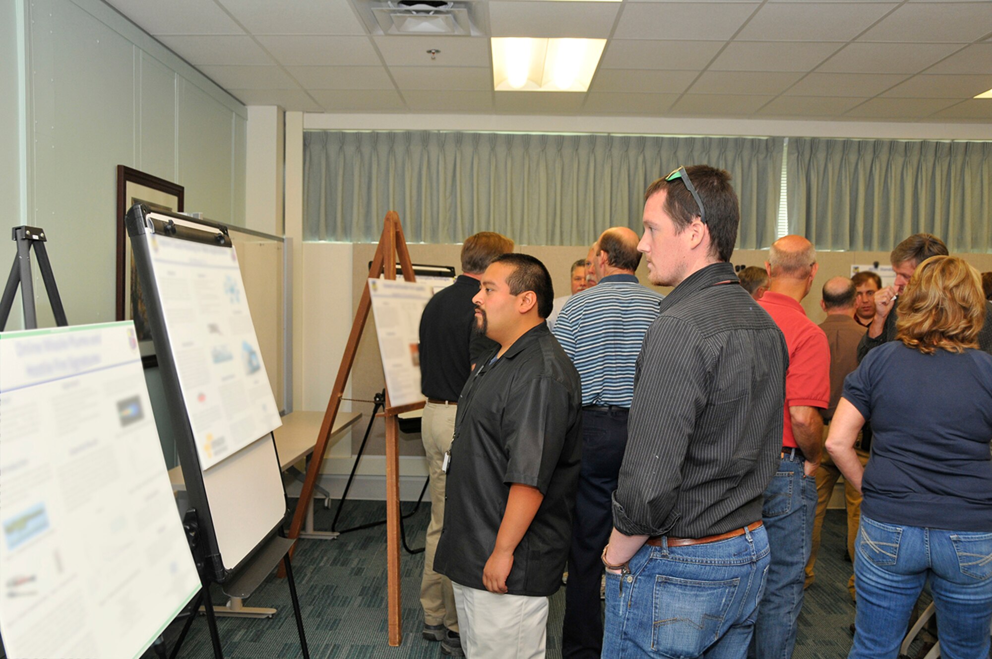 AEDC personnel view ATA Innovation Grant ideas during the recent AEDC Technical Excellence Seminar Poster Session. (Photo by Jacqueline Cowan)