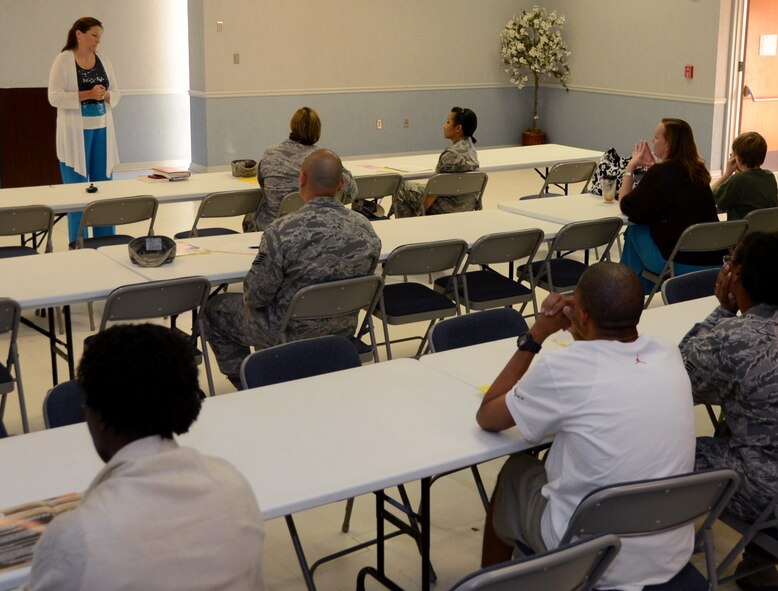 Lillian Holley, Behavior Interventionist Security with Bossier Parish Schools, speaks with Team Barksdale members during an anti-bullying conference on Barksdale Air Force Base, La., Aug. 22, 2013. Holley, along with other Bossier and Caddo Parish school officials and sheriff’s deputies, spoke during the conference about bullying in the local schools and opened the floor for questions on combating bullying. (U.S. Air Force photo/Staff Sgt. Amber Corcoran)