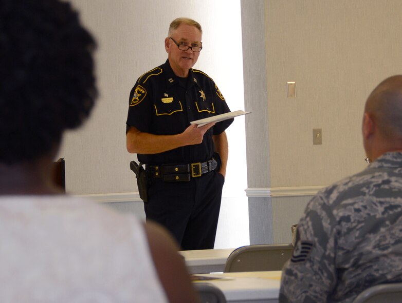 Capt. Danny Dison, Bossier Parish Schools Director of Security, speaks with Team Barksdale members during an anti-bullying conference on Barksdale Air Force Base, La., Aug. 22, 2013. Bossier and Caddo Parish school officials and sheriff’s deputies were on hand to answer any questions and concerns the base populace might have in regards to bullying in schools. (U.S. Air Force photo/Staff Sgt. Amber Corcoran)