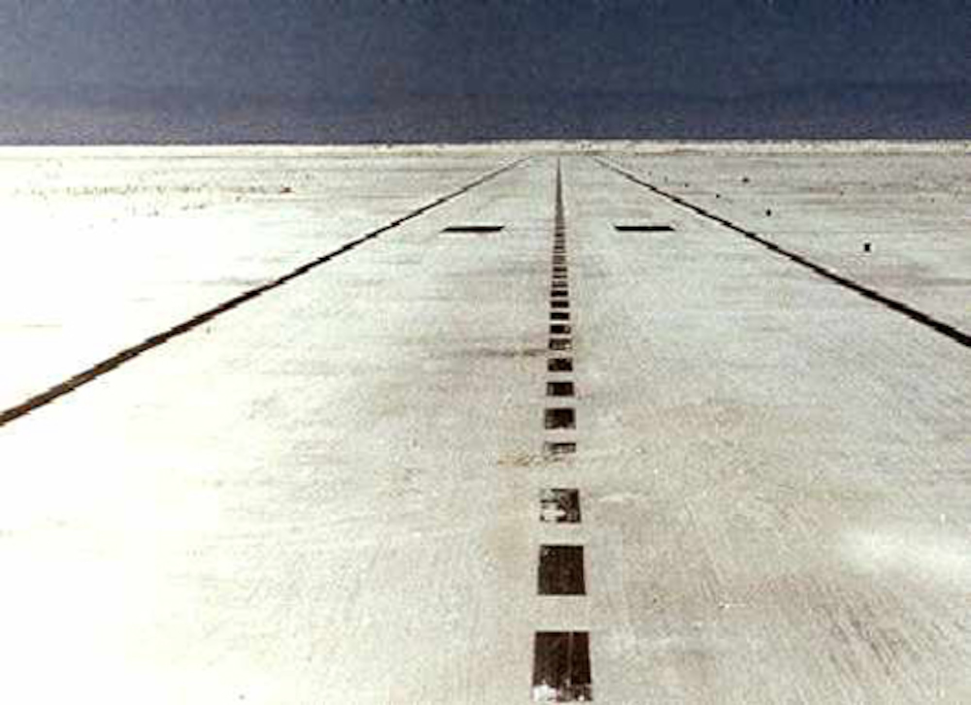 The Northrup Strip at White Sands Missile Range was the landing site for STS-3. The strip, which was renamed in 1982 to White Sands Space Harbor, is located between the San Andres Mountains on the west and the Sacramento Mountains on the east. This area is known as Alkali Flats, which is part of the now-dry Lake Otero, a lake that filled the bottom of the Tularosa Basin during the last ice age. The area provides “excellent margins of safety” on the compacted salt and gypsum. (photo courtesy of 49th Wing History Office)