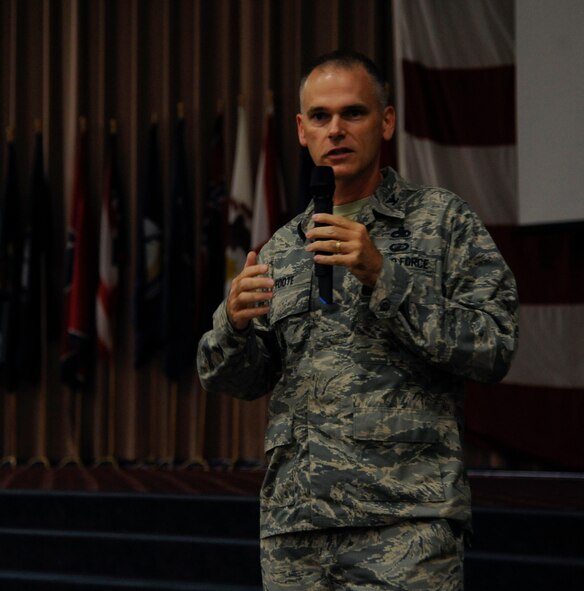 Col. David Foote, 2nd Maintenance Group commander, speaks at the Street Smart presentation at Hoban Hall on Barksdale Air Force Base, La., Aug. 29, 2013. The briefing was held before the Labor Day weekend to give Barksdale Airmen tips to stay safe and prevent vehicular mishaps. (U.S. Air Force photo/Airman 1st Class Andrew Moua)