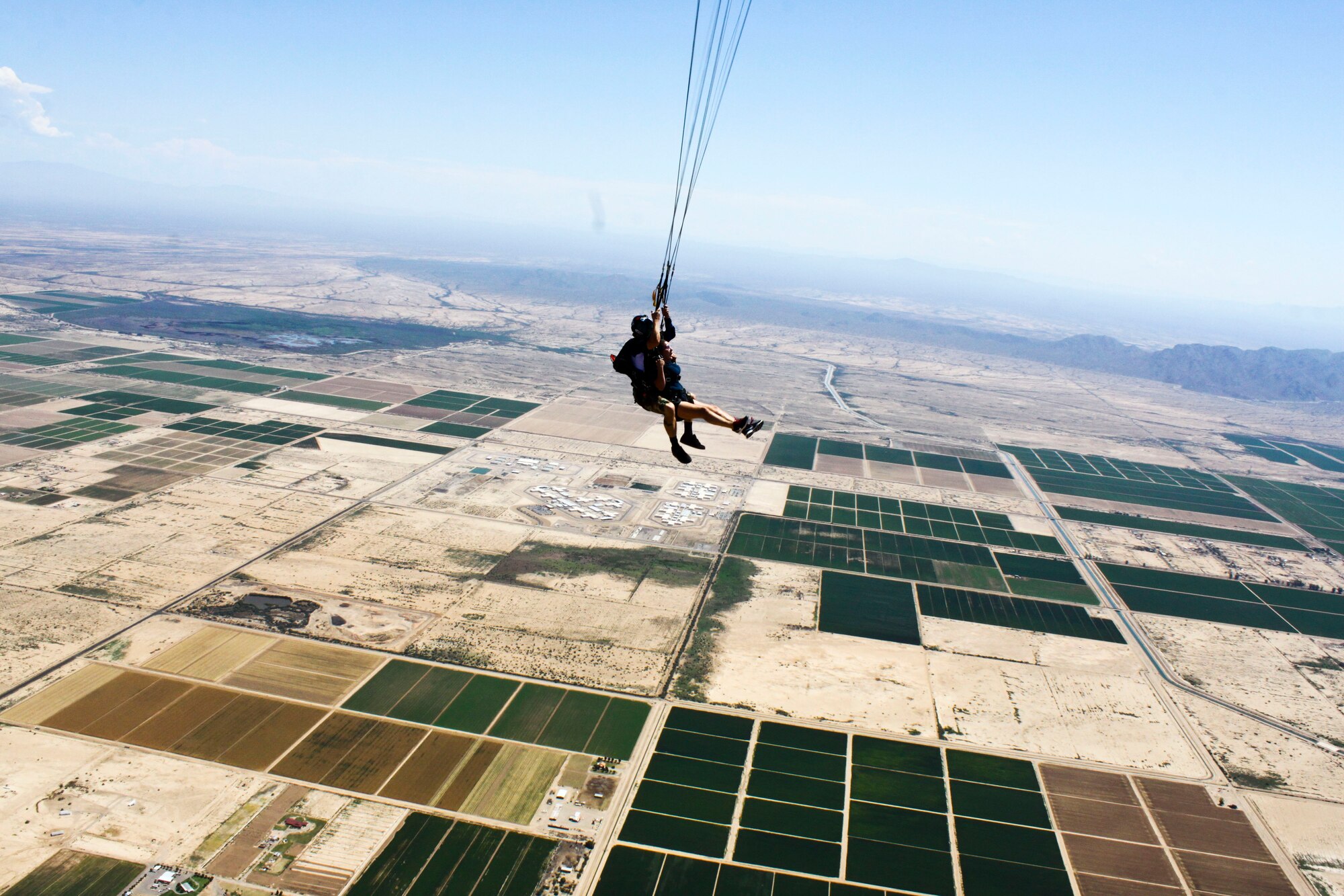 Airman 1st Class Yadira Chaidez, 56th MDOS aerospace medical technician, performs a tandem skydive with an instructor. (Courtesy photo)