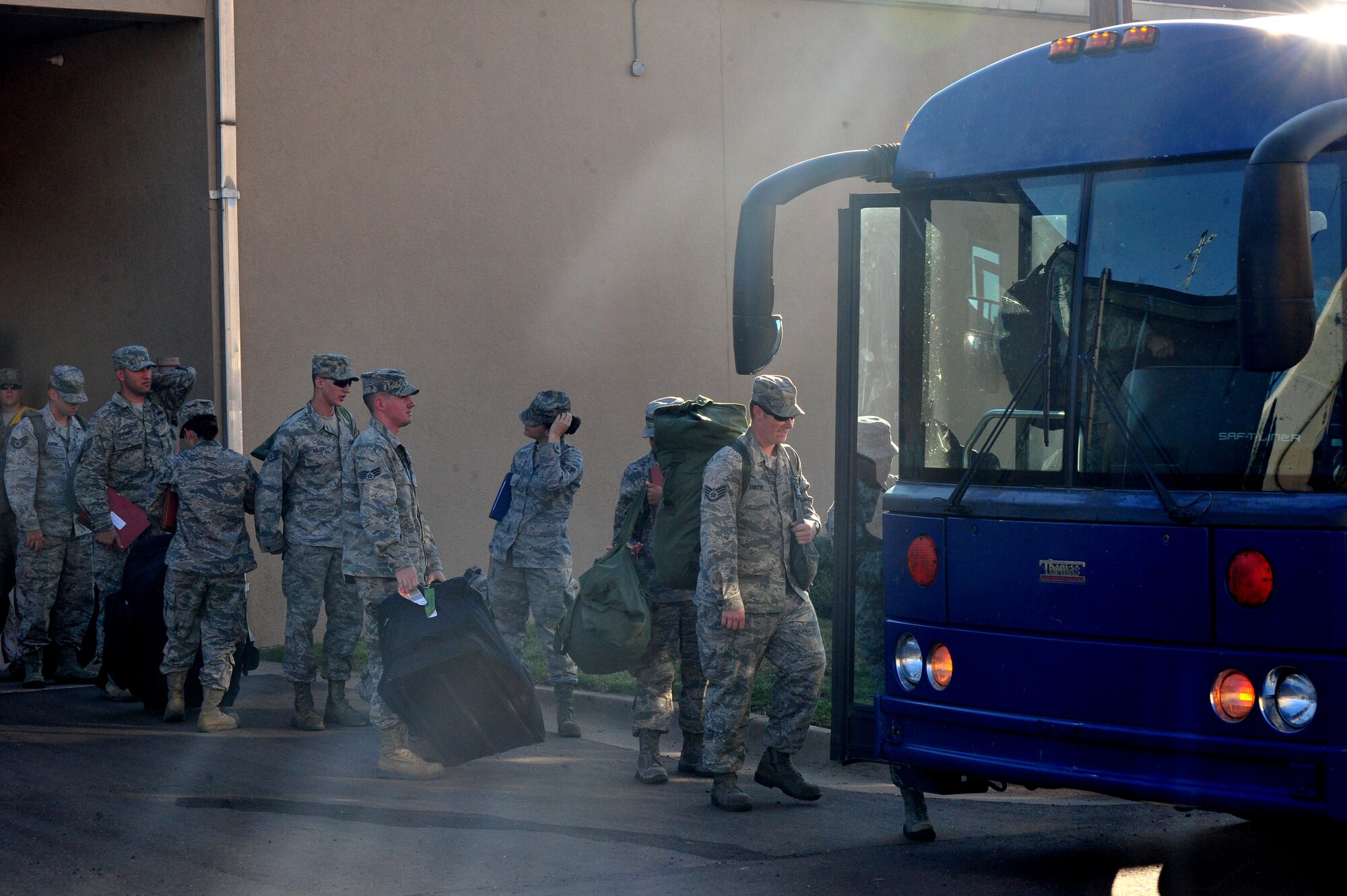 U.S. Air Force Air Commandos board a bus during an exercise Aug.27, 2013 at Cannon Air Force Base, N.M. Deployment exercises provide vital training and prepare Airmen for worldwide deployment. (U.S. Air Force photo/Senior Airman Xavier Lockley)