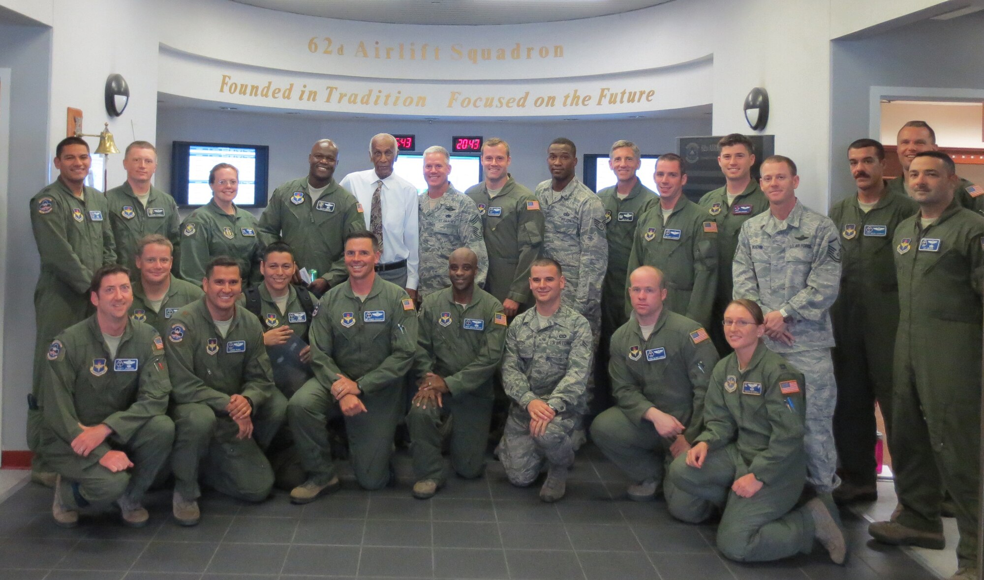 Milton Crenchaw, an original Tuskegee Airmen civilian flight instructor, visited the 62nd Airlift Squadron August 22 at Little Rock Air Force Base, Ark. He is pictured with Airmen from the 314th Airlift Wing, who are responsible for training the next generation of Combat Airlifters and Maintainers. (Courtesy photo)