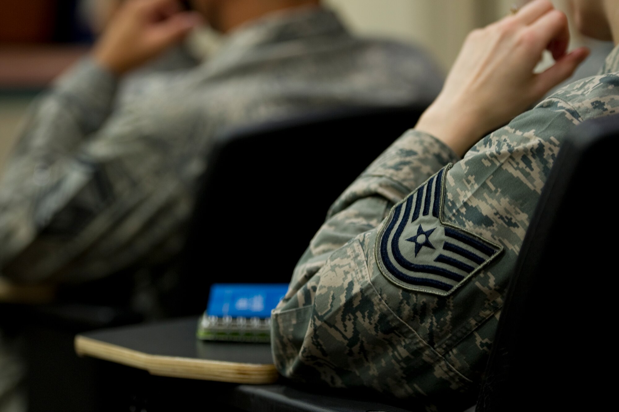A Tech. Sgt. listens to the "Five Levels of Leadership course at the King Auditorium at Hurlburt Field, Fla. Aug. 23.  The Top-3 Professional Development Team offered the course to Airmen of all ranks at Hurlburt Field.(U.S. Air Force Photo/Senior Airman  Naomi Griego)