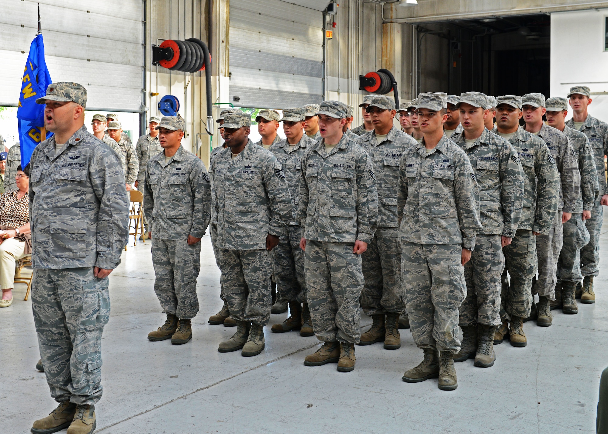 The 603rd Air Control Squadrons shouts their squadron motto, “We see all,” during an inactivation ceremony, Aug. 29, 2013, at Aviano Air Base, Italy. When a squadron is inactivated, the unit is placed on the inactive list in Washington, D.C. The last time the squadron was reactivated was in 1991. (U.S. Air Force photo/Airman Ryan Conroy) 