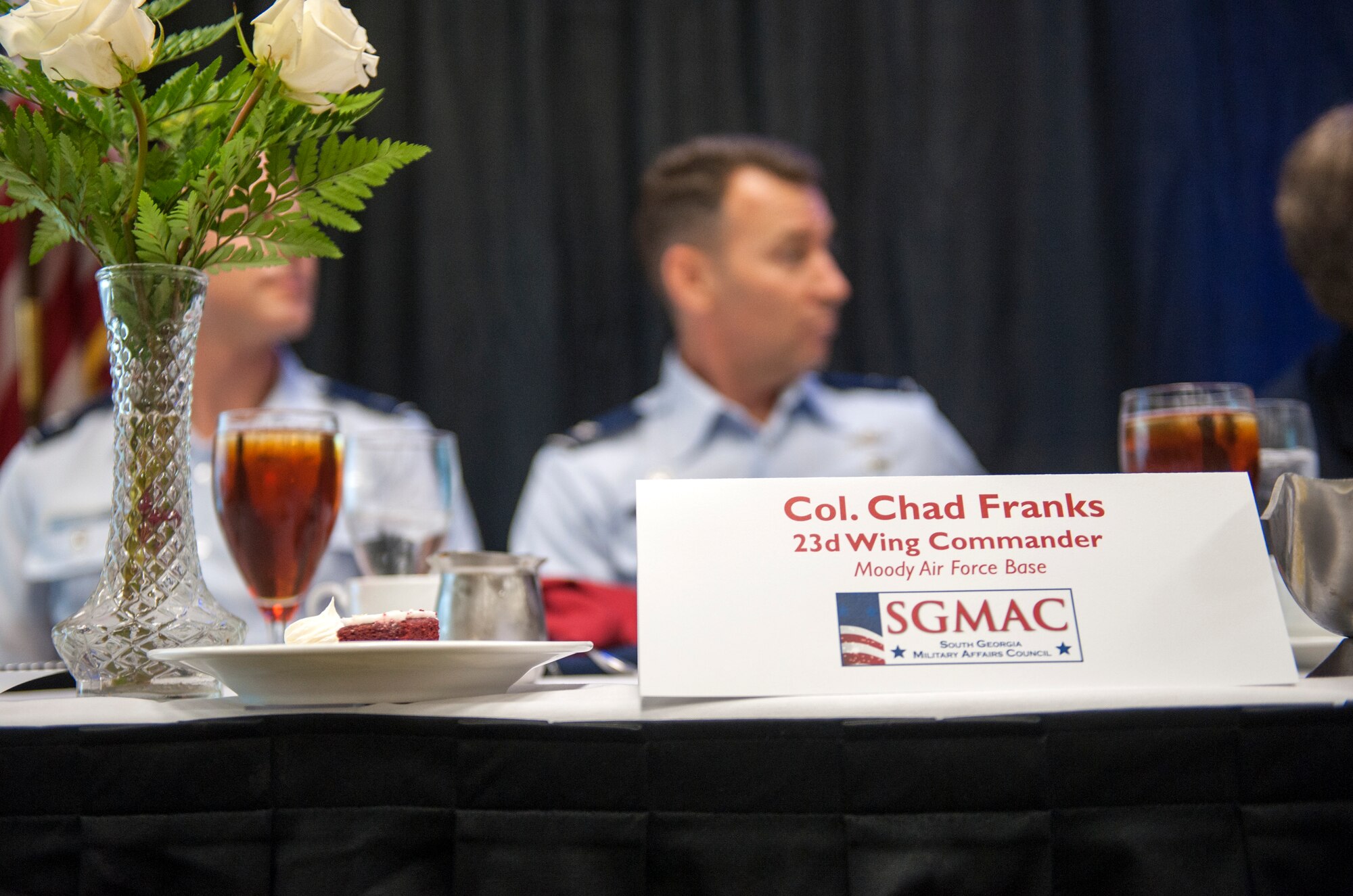 U.S. Air Force Col. Chad Franks, 23d Wing commander, sits at the head table during the South Georgia Military Affairs Council (SGMAC) luncheon in Valdosta, Ga., Aug. 23, 2013. SGMAC members welcomed Franks to Moody Air Force Base and Valdosta, Ga., during the event. (U.S. Air Force photo by Senior Airman Jarrod Grammel/Released)