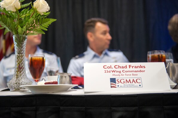 U.S. Air Force Col. Chad Franks, 23d Wing commander, sits at the head table during the South Georgia Military Affairs Council (SGMAC) luncheon in Valdosta, Ga., Aug. 23, 2013. SGMAC members welcomed Franks to Moody Air Force Base and Valdosta, Ga., during the event. (U.S. Air Force photo by Senior Airman Jarrod Grammel/Released)