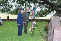 On Aug. 27 each year, in honor of the birth date of former U.S. President  Lyndon B. Johnson, a wreath laying ceremony, sponsored by the National Park Service is held at the Johnson's private cemetery in Stonewall, Texas.  Brig. Gen. Bob LaBrutta, 502nd Air Base Wing and Joint Base San Antonio commander; and Russ Whitlock, superintendent for Lyndon B. Johnson National Historical Park; placed the wreath at the gravesite and both spoke during the ceremony. (U.S.Air Force photo by Rich McFadden/released)