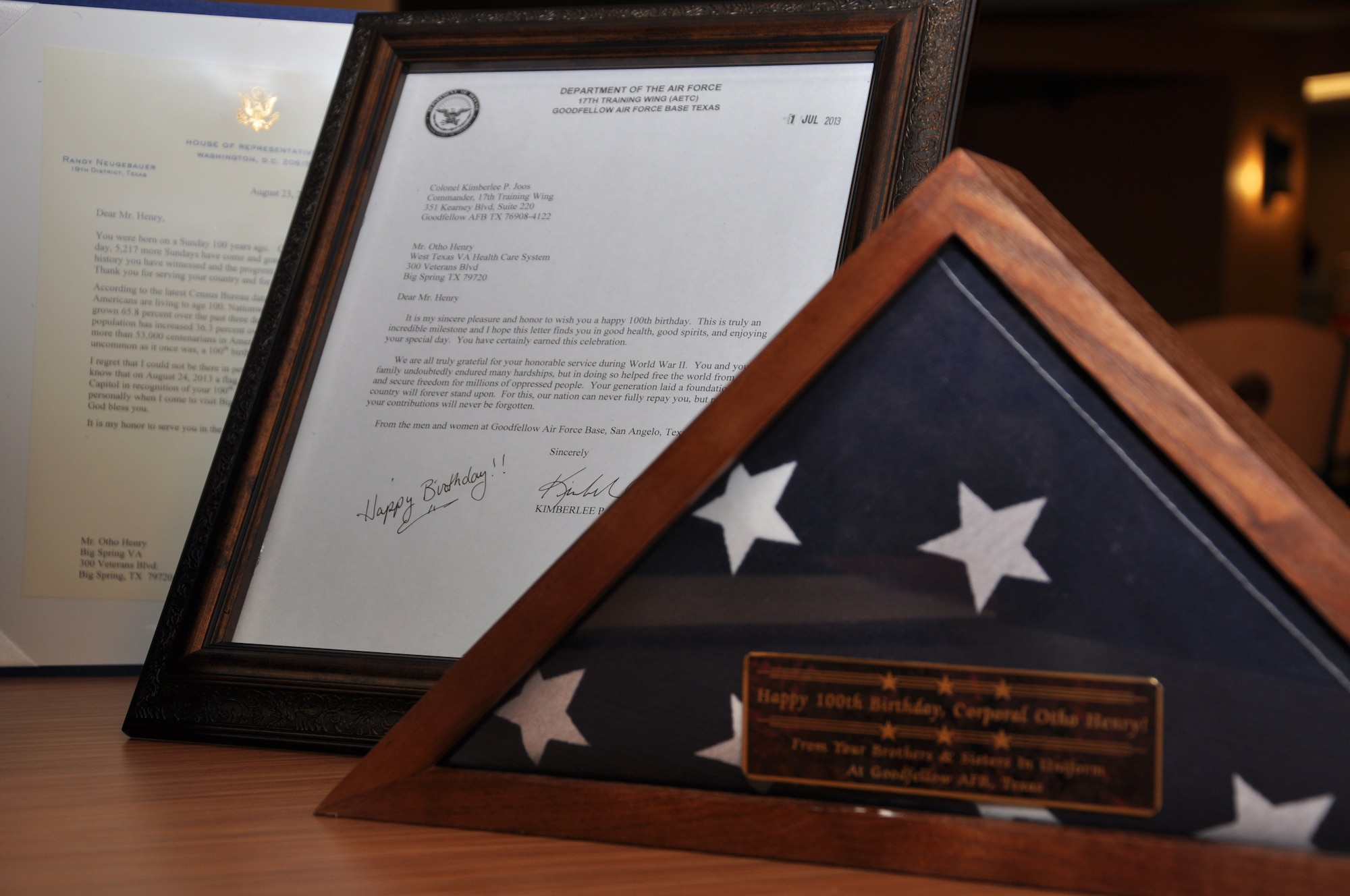 BIG SPRINGS, Texas- Mementos from Team Goodfellow members  to Otho Henry, World War II Army veteran, sit on display at the West Texas Veterans’ Affairs Health Care System Facility Aug. 23. Team Goodfellow presented the gifts as a sign of appreciation and respect for Henry’s service to his country. (U.S. Air Force photo/ Airman 1st Class Erica Rodriguez)