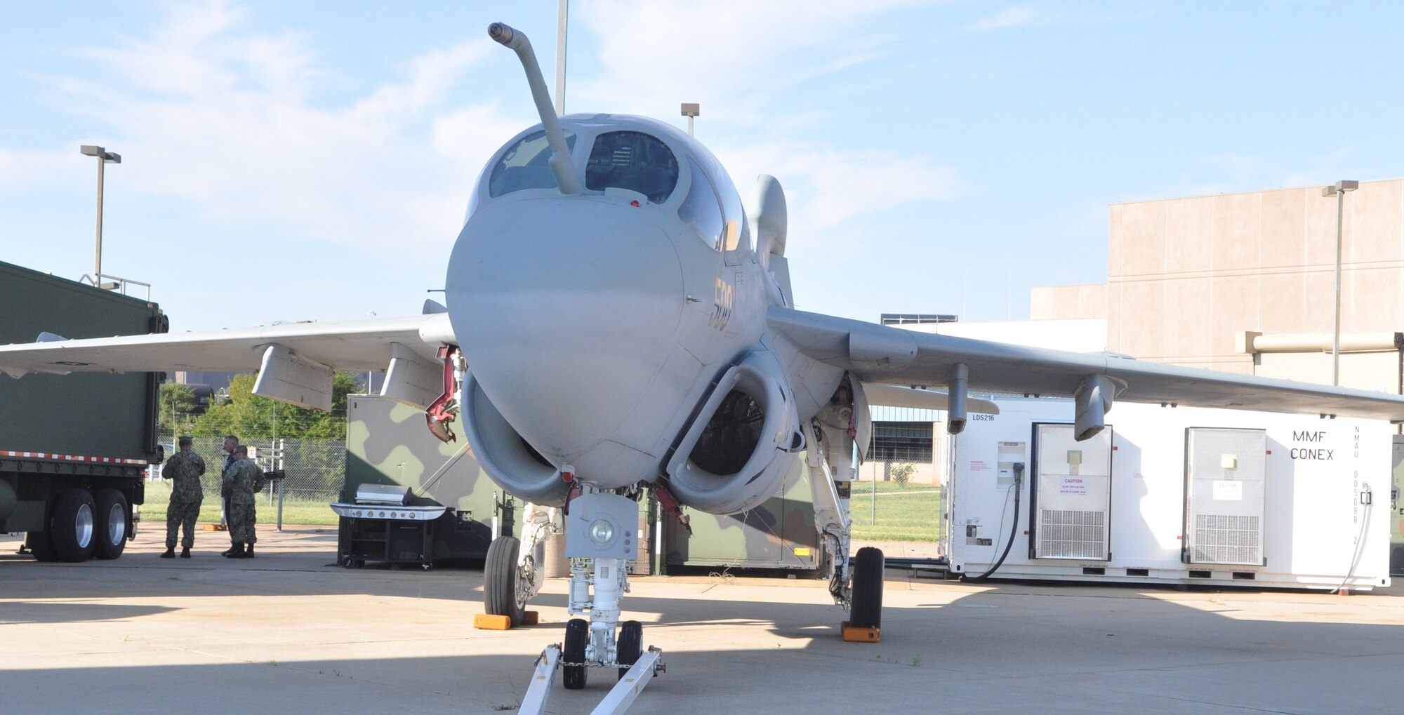 This retired EA-6B Prowler, an electronic warfare jet, sits outside a Navy hangar at Tinker AFB, waiting to be relocated in the Charles B. Hall Air Park near Tinker Gate. Preparation of the site for the static display, including the pad, pedestals and sidewalk, began recently. (U.S. Air Force photo by Mike Ray)