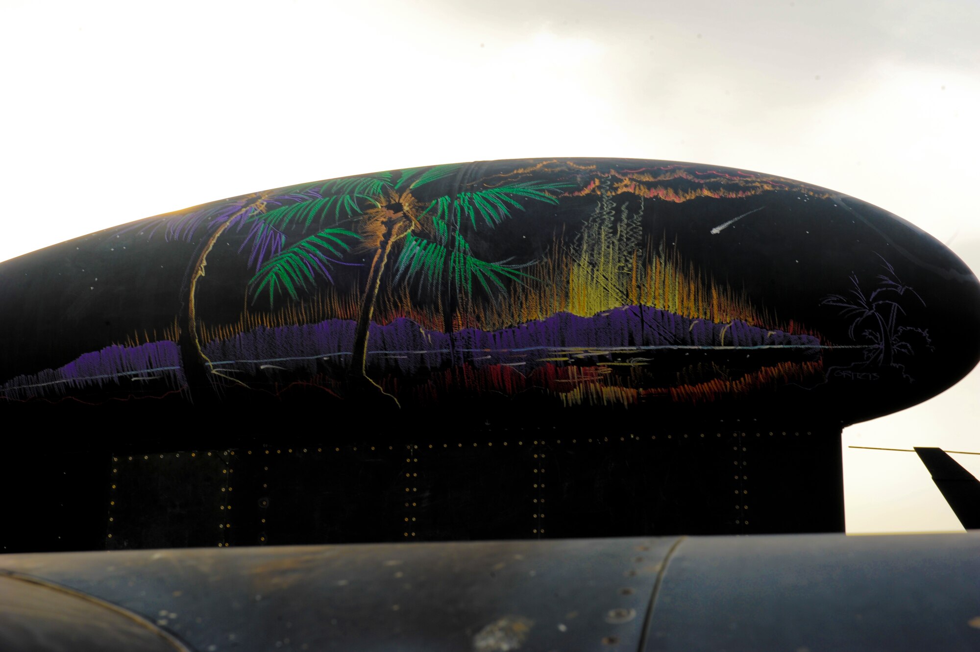 A beach setting image made of color chalk, sits on a U-2 Dragon Lady at an undisclosed location in Southwest Asia Aug. 13, 2013. The chalk was used in memory of U.S. Air Force Staff Sgt. Suzzett Stalesky, a member of the U-2 family, who recently passed away from cancer. The beach signifies Stalesky’s love of summer. (U.S. Air Force photo by Staff Sgt. Joshua J. Garcia) 