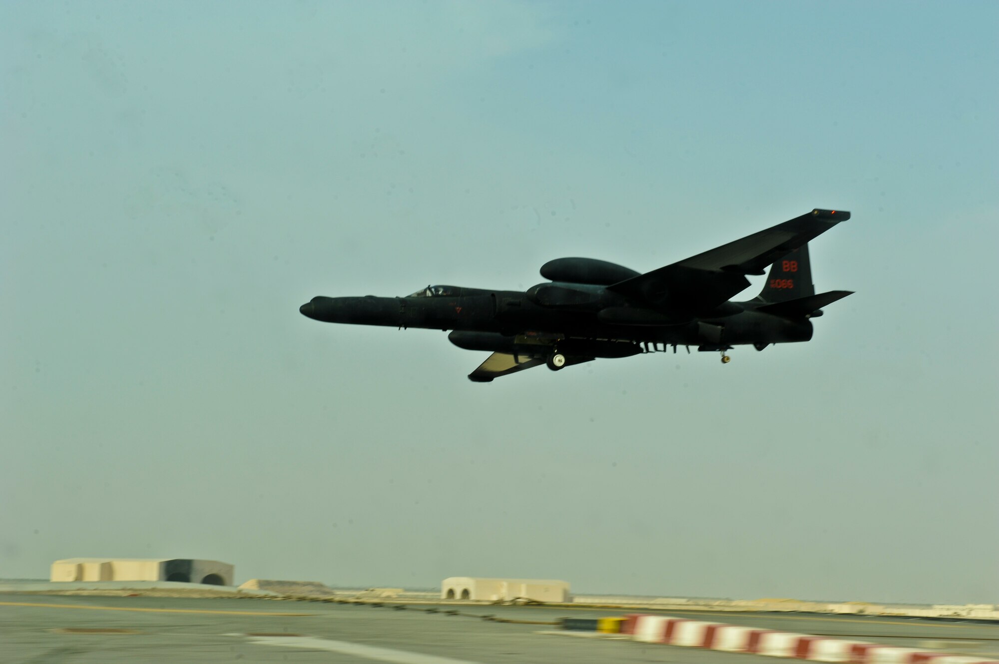 U.S. Air Force Maj. Daniel, 99th Expeditionary Reconnaissance Squadron pilot, lands a U-2 Dragon Lady after a memorial flight at an undisclosed location in Southwest Asia Aug. 12, 2013. The flight honored the passing of U.S. Air Force Staff Sgt. Suzzett Stalesky, a member of the U-2 family who recently passed away from cancer. (U.S. Air Force photo by Staff Sgt. Joshua J. Garcia) 