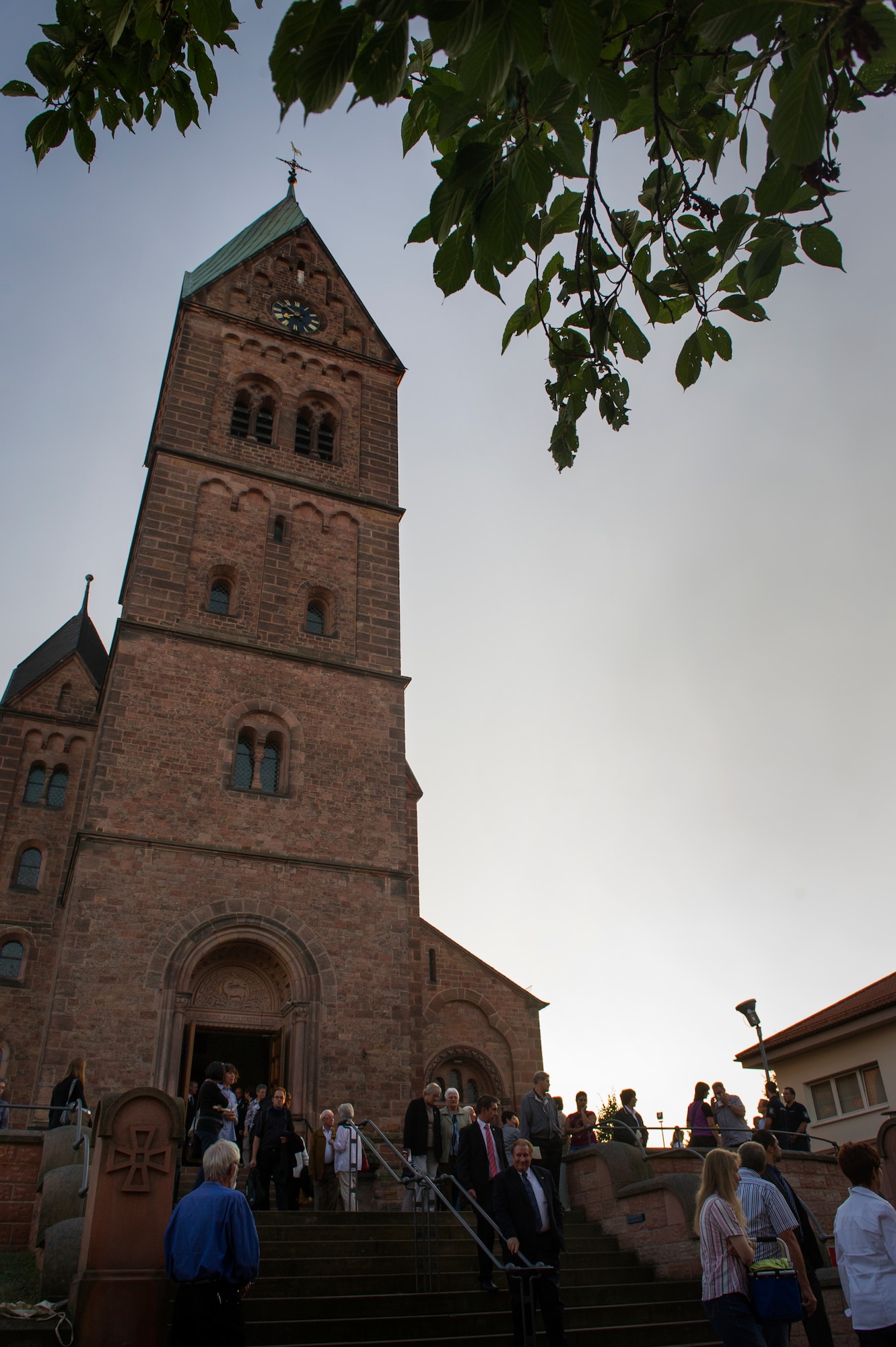 RAMSTEIN, Germany -- Parishioners exit the St. Nikolas Church where a memorial service was held Ramstein, Aug. 28, 2013 to commemorate the 1988 Ramstein air show disaster. The memorial marked the 25th anniversary of the disaster in which 70 people died after an Italian aerial demonstration team crashed. (U.S. Air Force photo/Tech. Sgt. Benjamin Wilson)