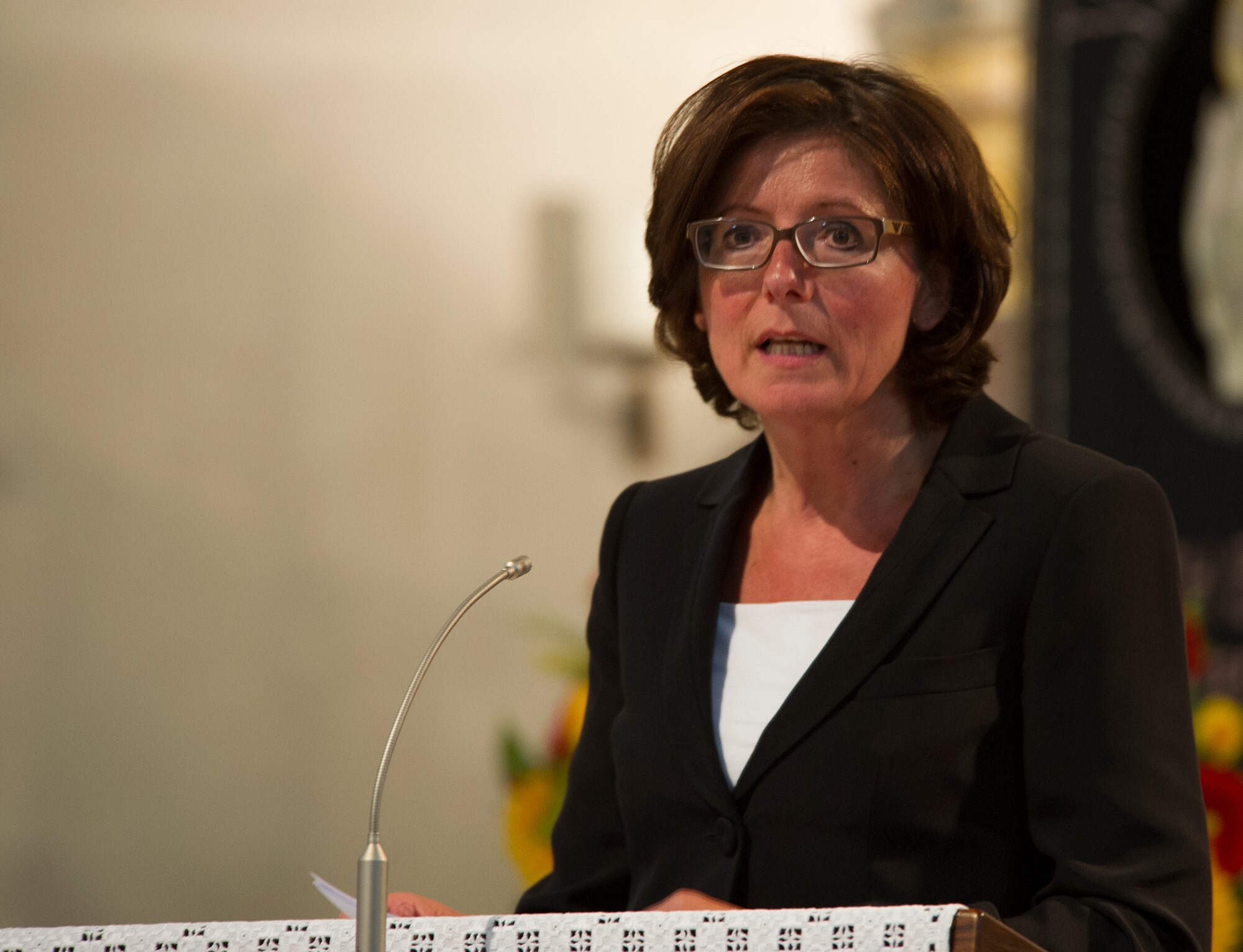RAMSTEIN, Germany -- Minister President of Rheinland-Pfalz Malu Dryer delivers a speech at a memorial service in the St. Nikolas Church for the 70 people who died in the 1988 Ramstein air show disaster, Aug. 28, 2013. The service marked the 25th anniversary of the disaster. (U.S. Air Force photo/Tech. Sgt. Benjamin Wilson)