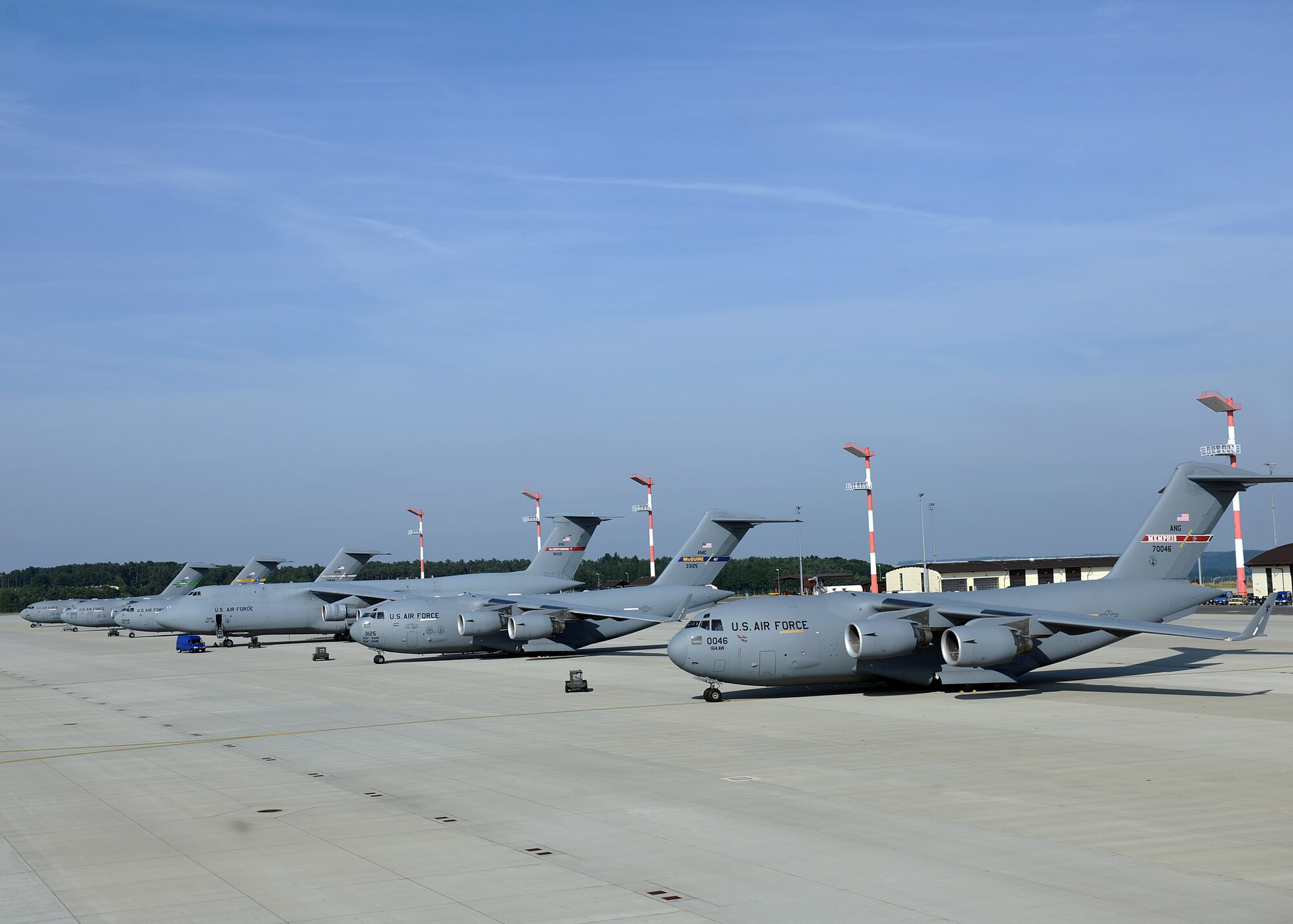 SPANGDAHELM AIR BASE, Germany— The 726th Air Mobility Squadron service six cargo aircraft on Spangdahlem Air Base July 26, 2013. The aircraft represented the total force, involving active duty, Reserve and Air National Guard aircraft. (U.S. Air Force photo by Staff Sgt. Daryl Knee)