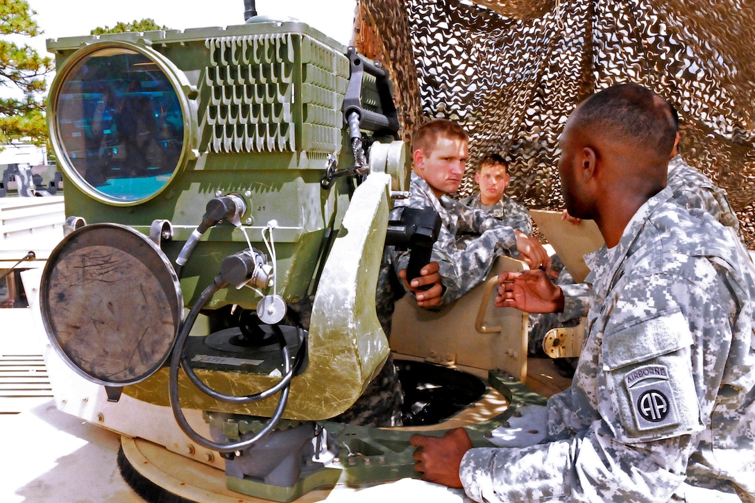 Army Sgt. Donald Flowers, Foreground, Instructs Paratroopers On Setting ...