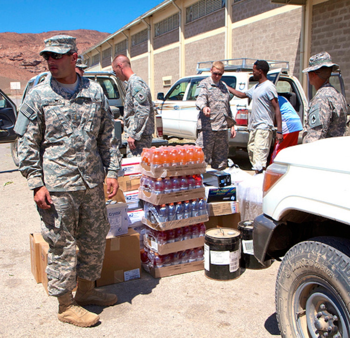 Soldiers from the 2/138th Field Artillery Regiment met at the border of Djibouti and Ethiopia to exchange supplies for the troops deployed to Camp Gilbert, Ethiopia.