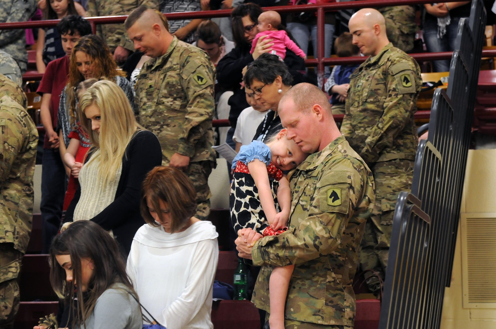 Soldiers, family members and friends attend a departure ceremony for the 1st Battalion, 623rd Field Artillery in Glasgow, Ky., Dec. 16, 2012. The unit will deploy to Jordan in January, 2013.