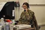 Senior Airman Keshia Shutts received a Christmas morning phone call from President Barack Obama while deployed at Kandahar Airfield, Afghanistan.