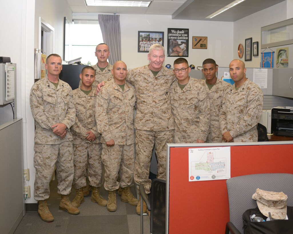 Lt.Gen Toolan, Commanding General of IMEF, poses with marines from the MCLB Barstow S-1. Lt.Gen Toolan toured MCLB Barstow on August 28, 2013.