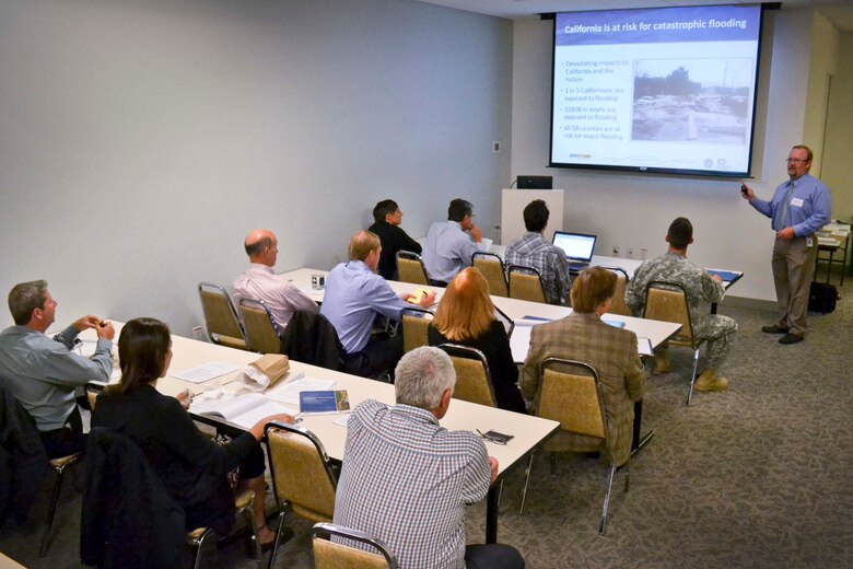 Jason Sidley of California Department of Water Resources (DWR) briefs part of the “California's Flood Future Highlights: Recommendations for Managing the State's Flood Risk” during a technical seminar at USACE, South Pacific Division Headquarters, San Francisco, Calif., Aug. 22. The report, prepared by USACE, DWR and various other state agencies, identifies and addresses the barriers to improved flood management. As the first comprehensive look at statewide exposure to flood risk, the report also provides information intended to inform decisions about policies and financial investments to improve public safety, foster environmental stewardship and support economic stability.