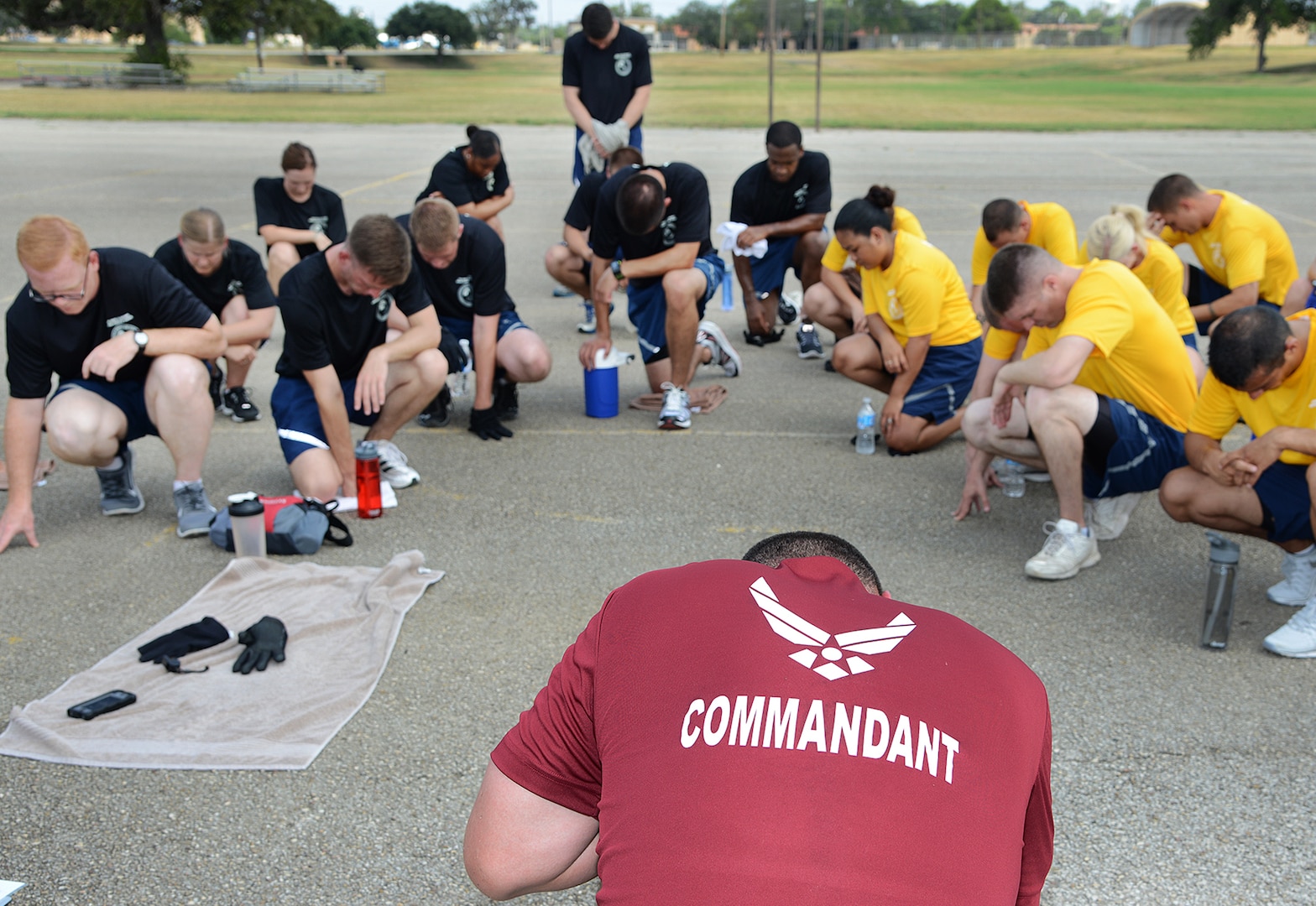 Master Sgt. John Chacon, Joint Base San Antonio Airman Leadership School commandant, pauses for a moment of silence to remember fallen Airman during warrior workouts at the Airman Leadership School August 19, at Joint Base San Antonio-Lackland. (U.S. Air Force photo by Benjamin Faske/released)