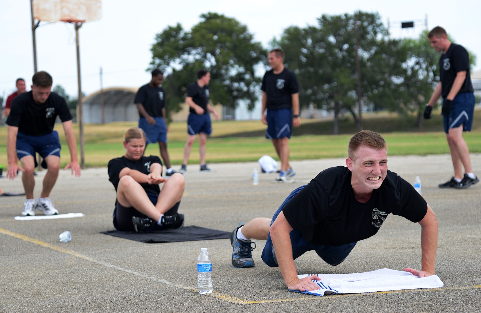 Senior Airman Douglas Turner, 959th Medical Group medical laboratory technician, takes part in a warrior workout session as part of the Airman Leadership School August 19, at Joint Base San Antonio-Lackland. (U.S. Air Force photo by Benjamin Faske/released)