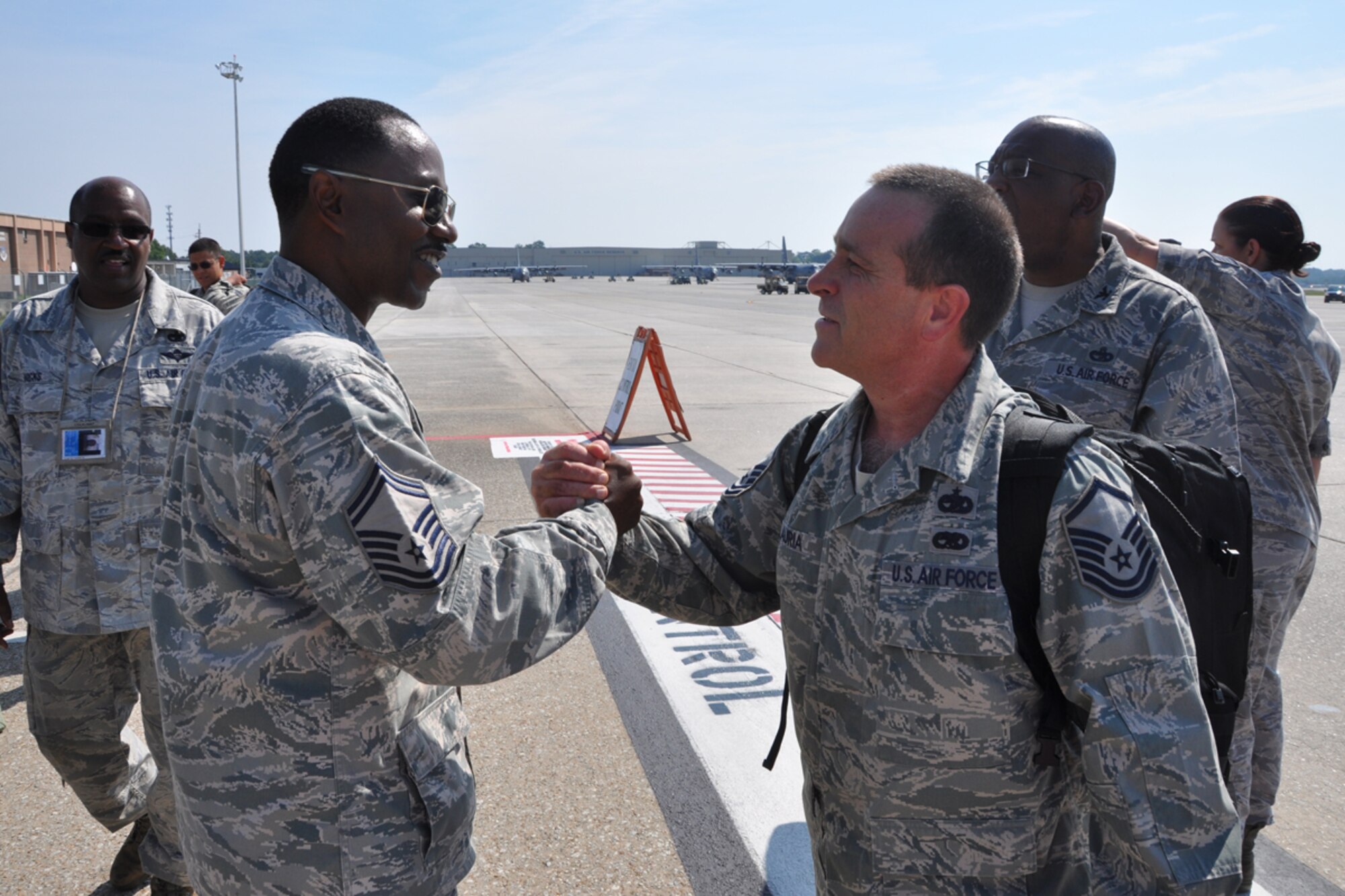 Senior Master Sgt. Lee Green, 80th Aerial Port Squadron cargo specialist, welcomes over 20 aerial porters home from a six-month deployment to Southwest Asia Aug. 27. The crew was greeted by family members and friends who they had not seen since February. (U.S. Air Force photo/James Branch)