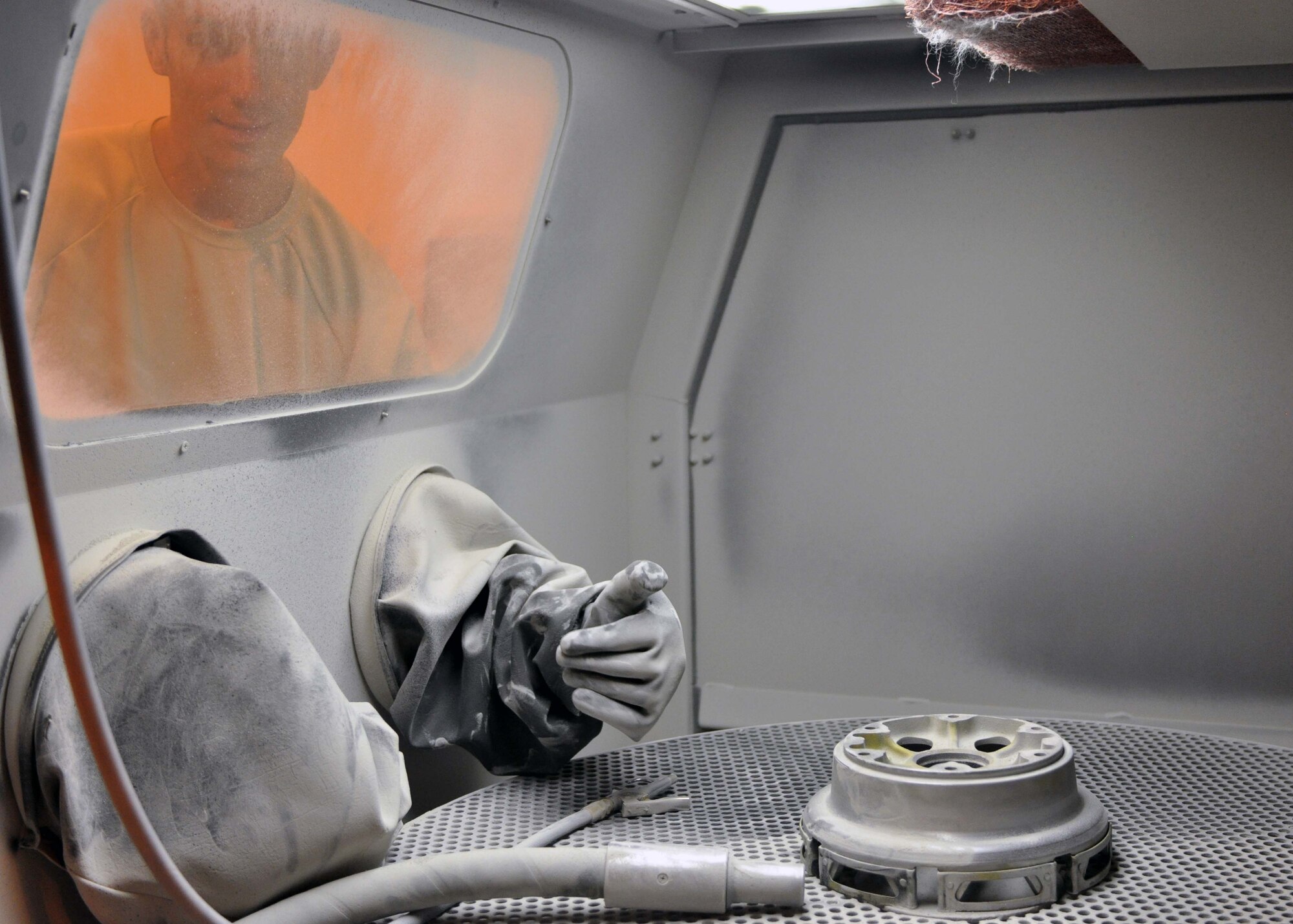 Senior Master Sgt. Marvin Howard strips a wheel of paint in the 379th Expeditionary Maintenance Squadron’s aircraft structural maintenance section at the 379th Air Expeditionary Wing in Southwest Asia, Aug. 27, 2013. The section was awarded the 379th Expeditionary Maintenance Group’s first ‘Innovator of the Month’ award in July for saving man hours and streamlining their daily operations. Howard is the 379th EMXS aircraft structural maintenance section chief deployed from Eielson Air Force Base, Alaska, and hails from Riceville, Tenn. (U.S. Air Force photo/1st Lt. Susan Harrington)