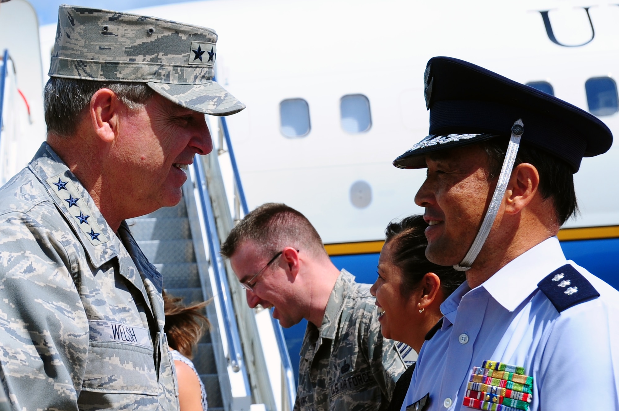 Air Force Chief of Staff Gen. Mark A. Welsh III is greeted by Lt. Gen. Tetsuo Morimoto, Northern Air Defense Force commander, upon his arrival to Misawa Air Base, Japan, Aug. 28, 2013.  During Welsh’s visit, his first to Misawa as the CSAF, he toured various locations on base and met with hundreds of Misawa Airmen. (U.S. Air Force photo by Tech. Sgt. April Quintanilla) 