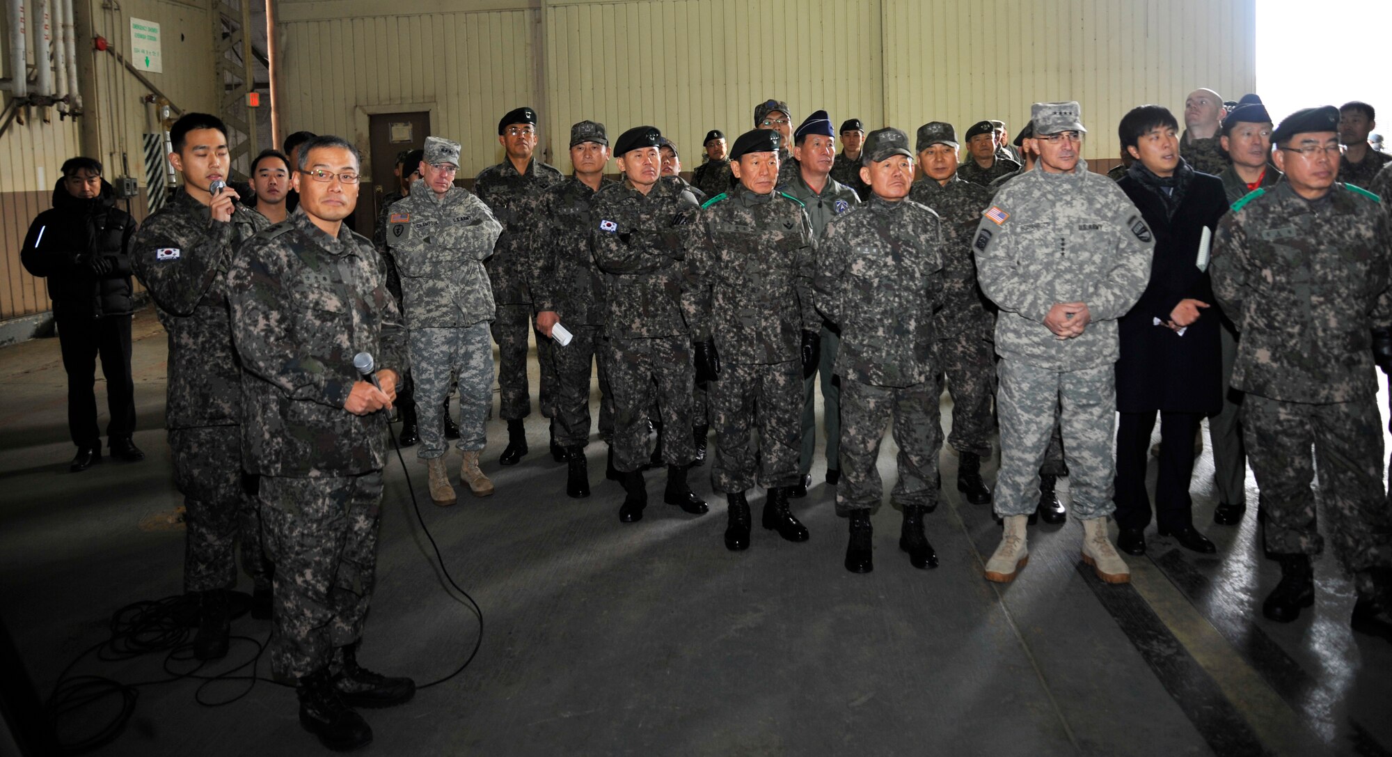 OSAN AIR BASE, Republic of Korea - Senior U.S. military and Republic of Korea officers are briefed during the command, control, communication, computers and intelligence summit at Osan Air Base, ROK, Nov. 26, 2013. Operational information is presented at the flag officer level to an audience of distinguished visitors from the Korean Peninsula and Pacific region during the summit. (U.S. Air Force photo/Staff Sgt. Emerson Nuñez)