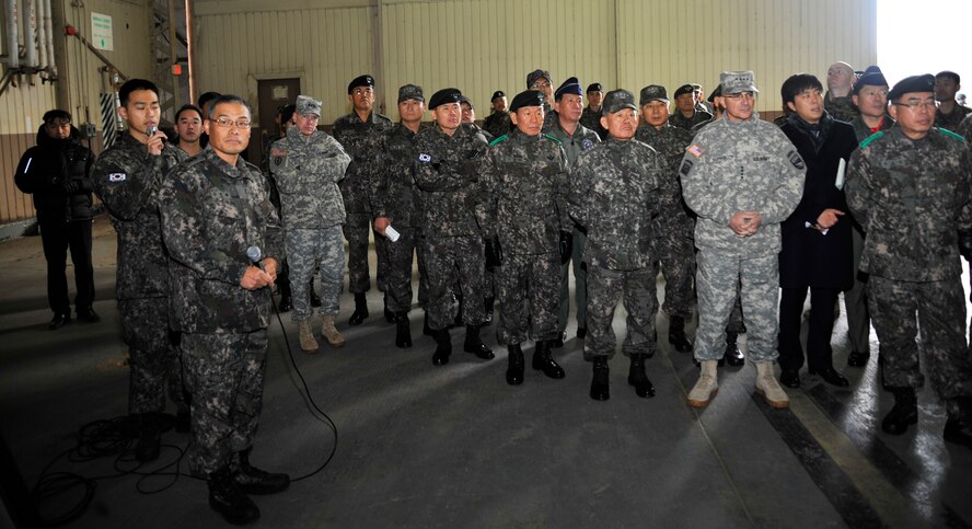 OSAN AIR BASE, Republic of Korea - Senior U.S. military and Republic of Korea officers are briefed during the command, control, communication, computers and intelligence summit at Osan Air Base, ROK, Nov. 26, 2013. Operational information is presented at the flag officer level to an audience of distinguished visitors from the Korean Peninsula and Pacific region during the summit. (U.S. Air Force photo/Staff Sgt. Emerson Nuñez)