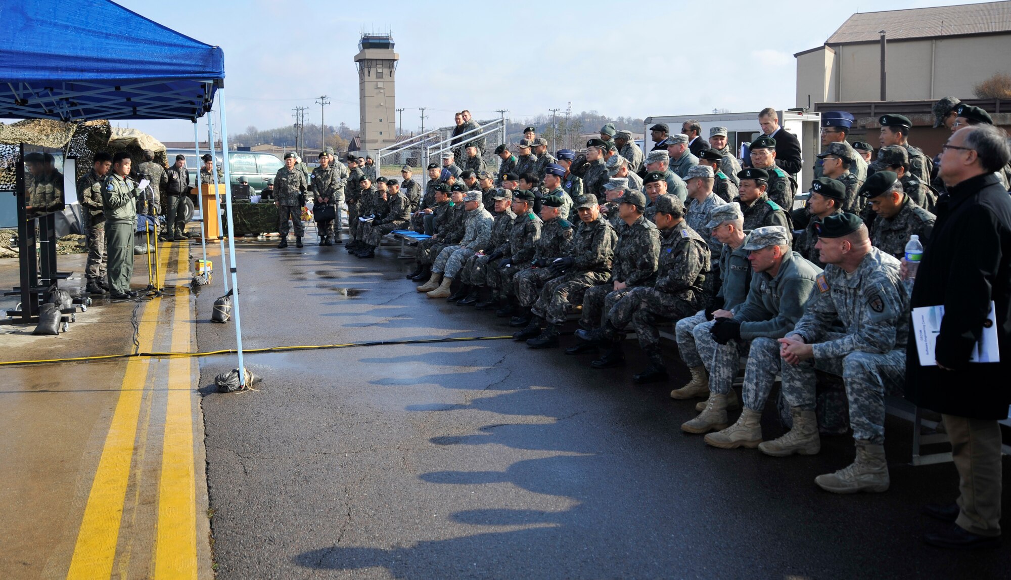 OSAN AIR BASE, Republic of Korea - Senior U.S. military and Republic of Korea officers receive a briefing during the command, control, communication, computers and intelligence summit at Osan Air Base, ROK, Nov. 26, 2013. The C4I Summit is a peninsula-wide event that showcases airpower to the key military leaders in the Pacific region. (U.S. Air Force photo/Staff Sgt. Emerson Nuñez)