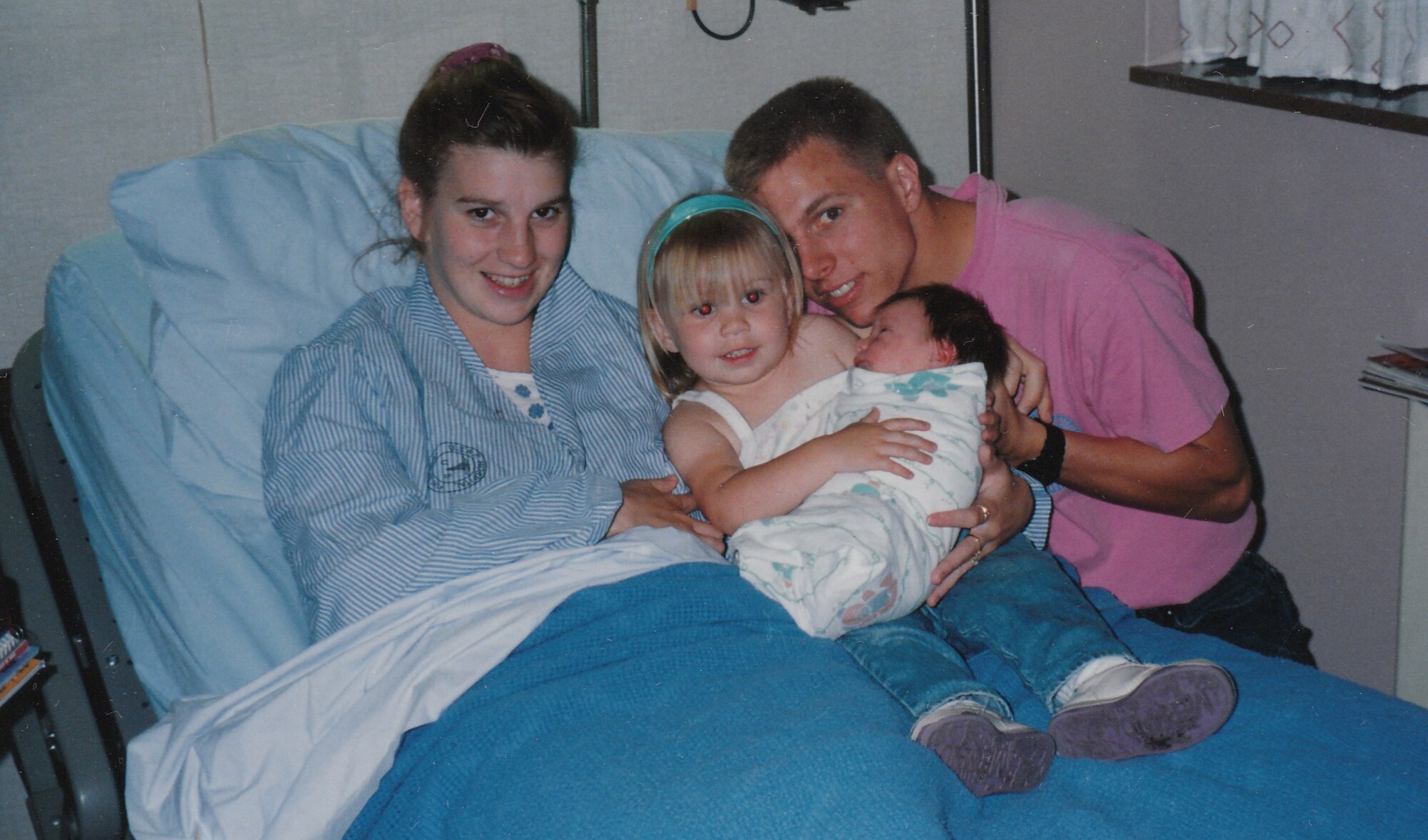 Chief Master Sgt. Matthew Grengs and his wife, Estelle, pose for a smile with their two children, Jacob and Korissa. Grengs is the 52nd Fighter Wing command chief and has served in the U.S. Air Force for 23 years. (Courtesy photo/Chief Master Sgt. Matthew Grengs)