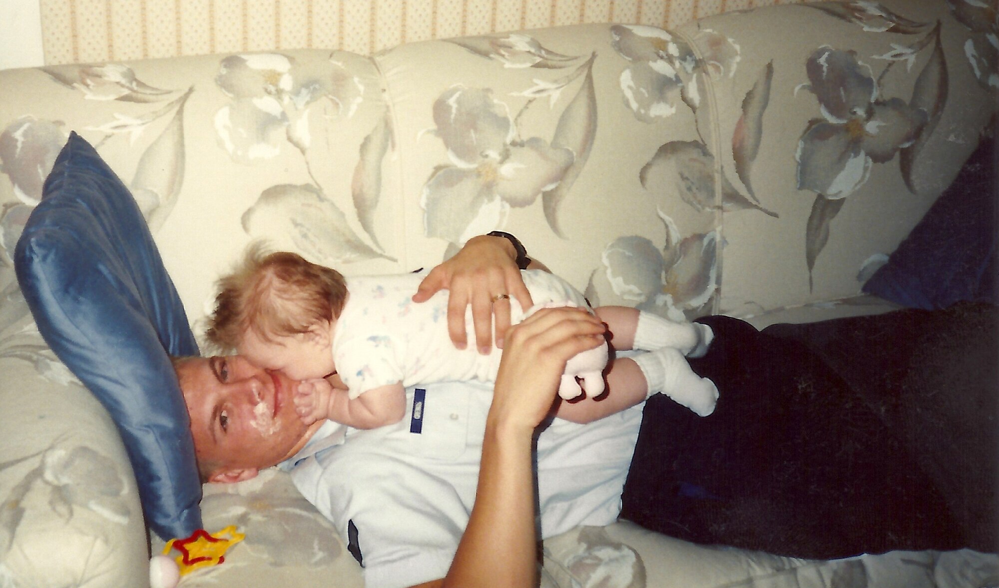 Chief Master Sgt. Matthew Grengs cuddles with his young daughter, Korissa, as a junior enlisted Airman. Grengs is the 52nd Fighter Wing command chief and the primary adviser to the wing commander on all matters concerning health, welfare, readiness, morale and proper utilization and progress of more than 4,100 enlisted service members assigned to the wing. (Courtesy photo/Chief Master Sgt. Matthew Grengs)