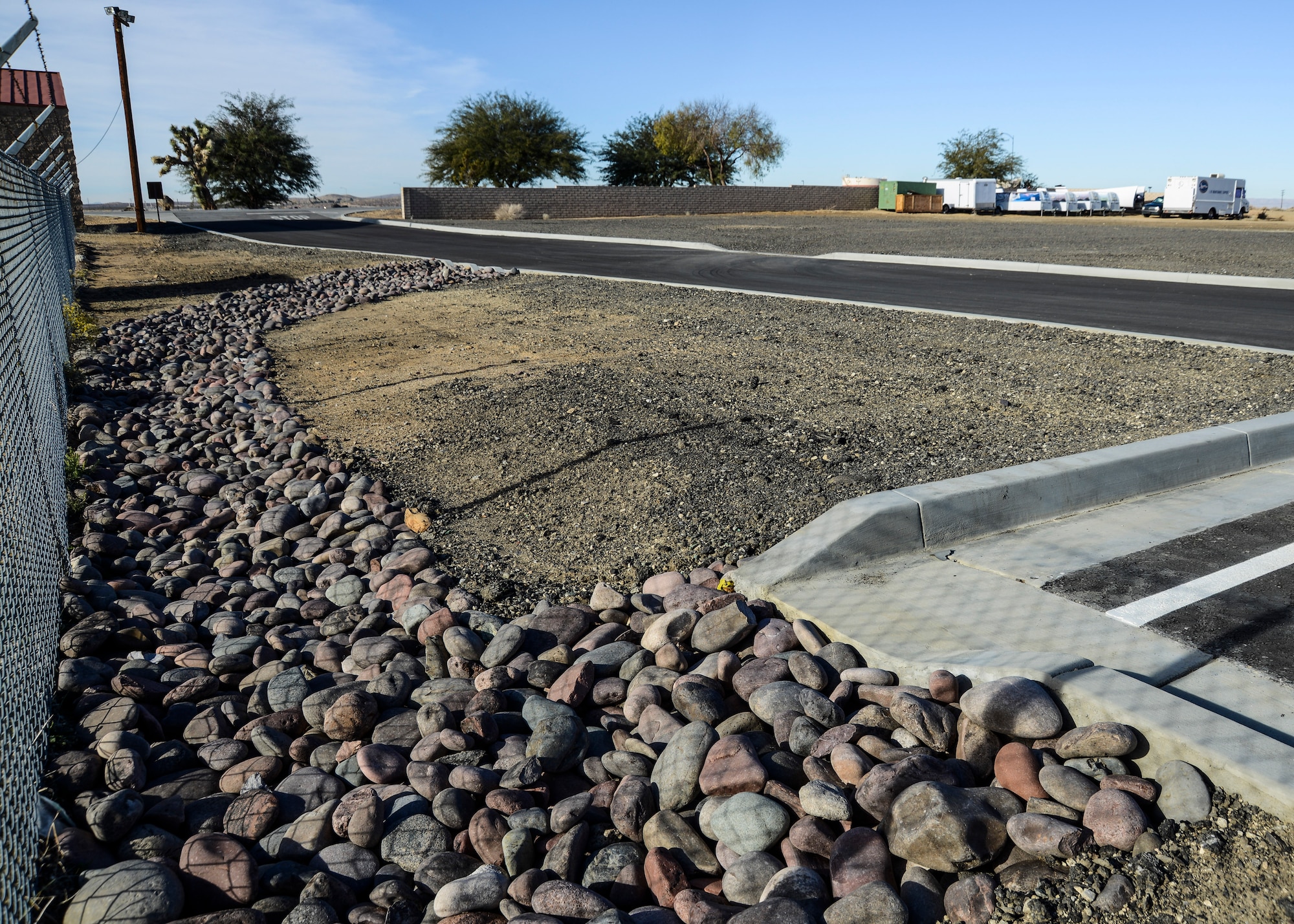 The west end of the USAF Test Pilot School parking lot has improved drainage for heavy rains and a smoothed out dirt lot for over-flow parking.  (U.S. Air Force Photo by Rebecca Amber)