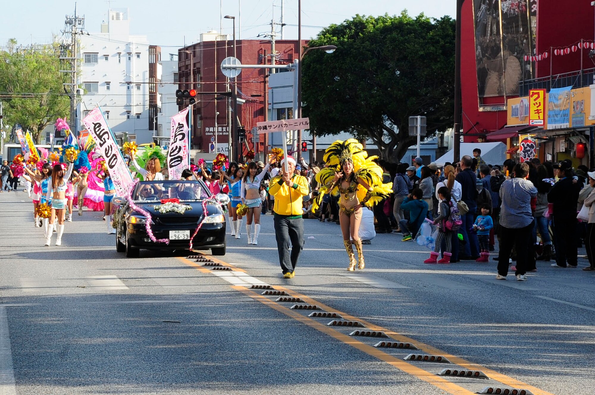 Approximately 800 Okinawan and American residents participated in the International Parade during the International Carnival in Okinawa, Japan, Nov. 30, 2013. These parade participants included volunteers from Okinawa Latin America Association, Okinawa Military Lodge # 68, Kokeshi Roller Dolls and representatives from the U.S. military bases across Okinawa. This is the 22nd carnival which promotes international friendships across diverse cultures through a variety of music, sports and stage events. (U.S. Air Force photo by Staff Sgt. Darnell T. Cannady)