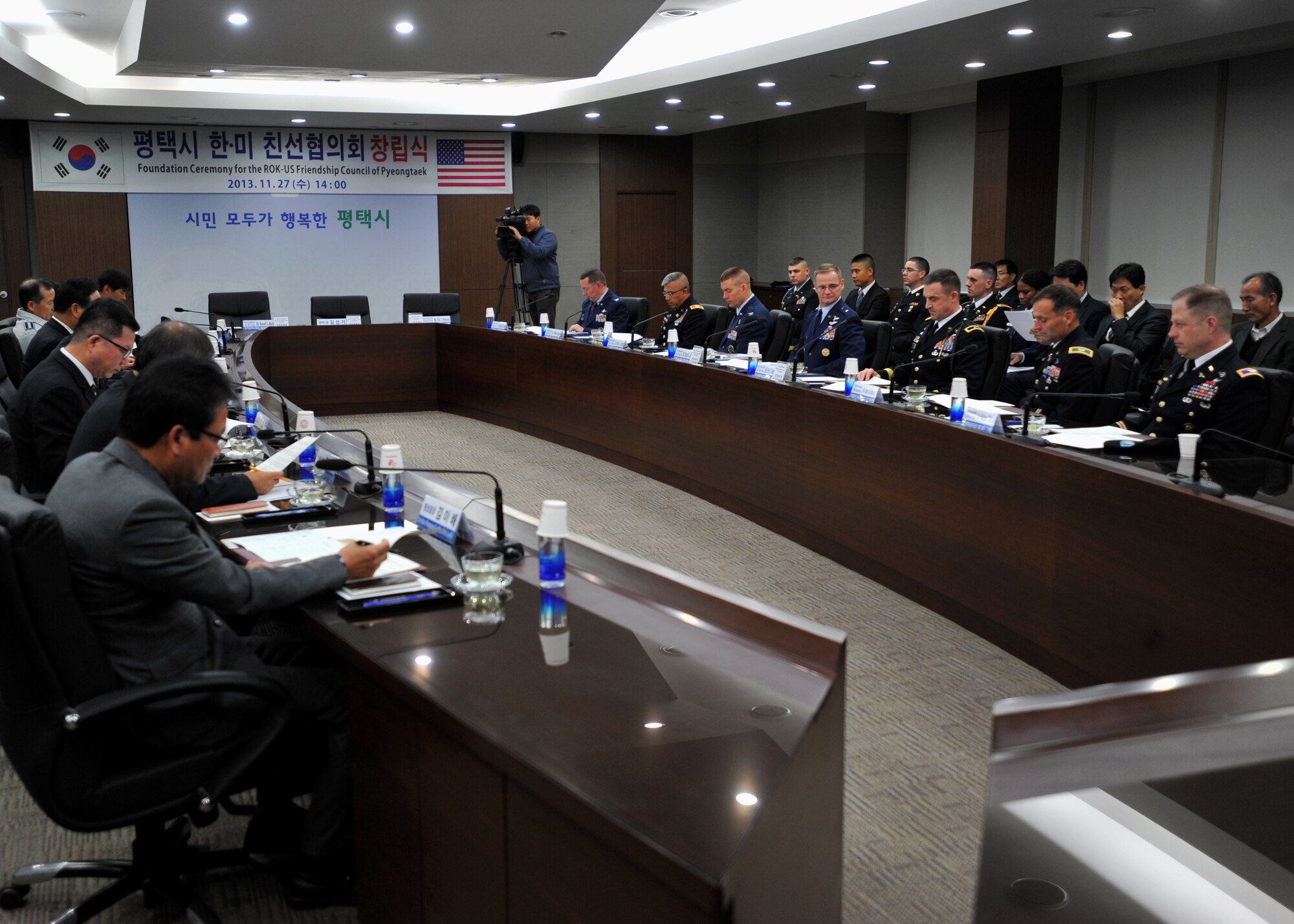 Members of the Republic of Korea-U.S. Friendship Council of Pyeongtaek meet during the council’s foundation ceremony at Pyeongtaek City, ROK, Nov. 27, 2013. The council, which consists of senior leaders of 7th Air Force and the U.S. Army’s 2nd Infantry Division, was formed to enhance the friendship between the local Korean community and the U.S. armed forces in the ROK. (U.S. Air Force photo/Senior Airman Siuta B. Ika)