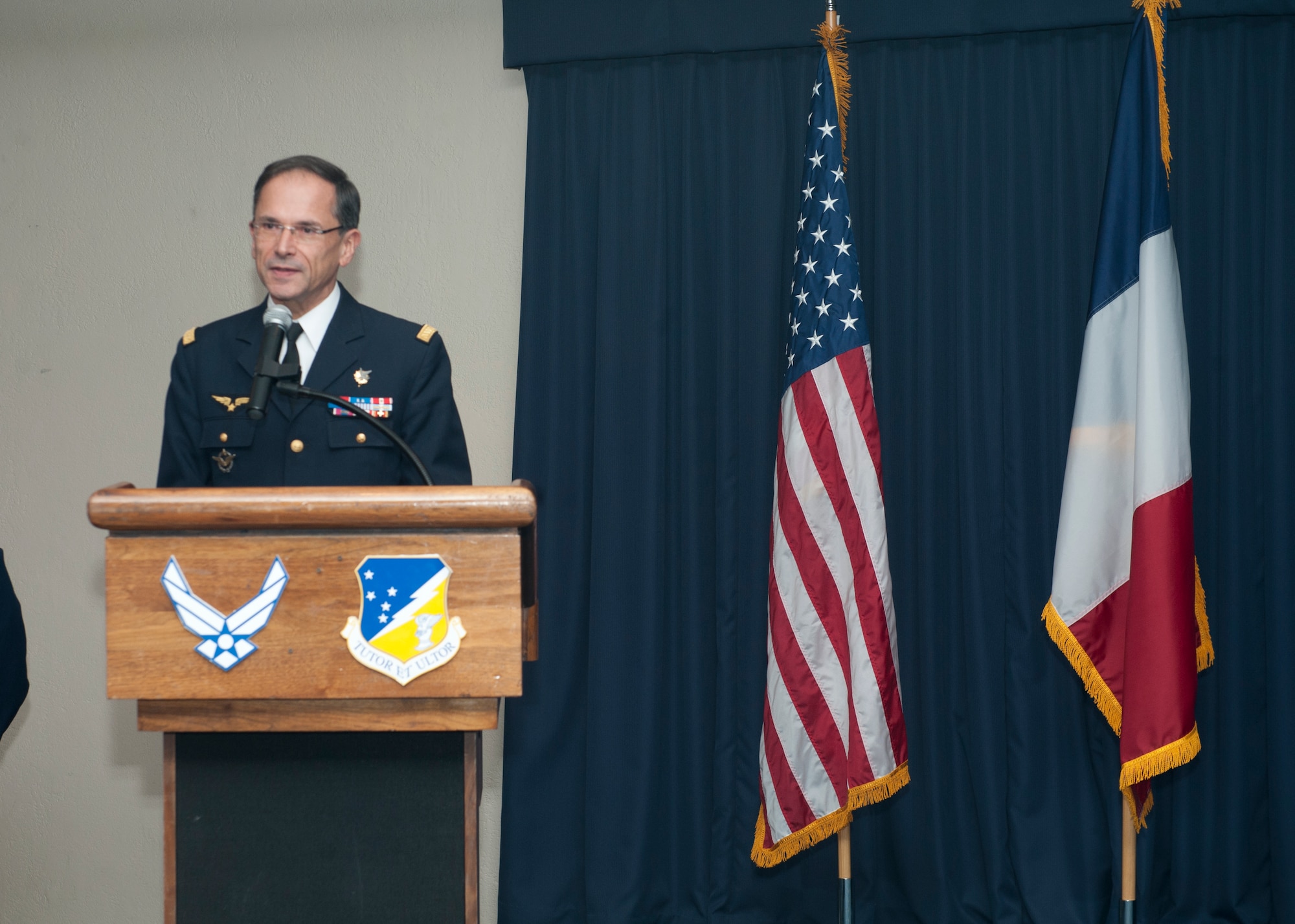 Lt. General Antoine Creux, French air force deputy chief of staff, delivers a closing speech at the MQ-9 Reaper graduation ceremony at Holloman Air Force Base, N.M., Nov. 26. The French air force worked in collaboration with Holloman AFB to graduate six student pilots and sensor operators from the 16th Training Squadron.  The students became the first-ever French air force members to learn the MQ-9 Reaper system, and their landmark graduation will mark the beginning of future coalition efforts between France and the U.S. to better utilize Remotely Piloted Aircraft across the world. Creux visited Holloman AFB both to take part in the graduation ceremony, and to tour Holloman AFB’s MQ-9 training facilities. (U.S. Air Force phot by Airman 1st Class Daniel E. Liddicoet)

