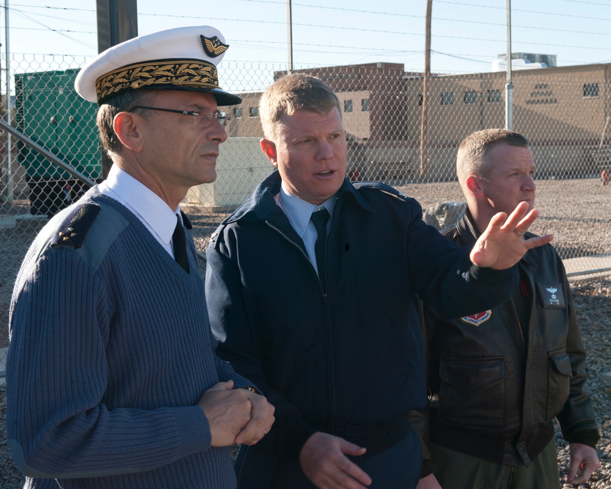 Colonel Andrew Croft, 49th Wing commander, tours the MQ-9 training facilities with Lt. Gen. Antoine Creux, French air force deputy chief of staff, at Holloman Air Force Base, N.M., Nov. 26. The French air force worked in collaboration with Holloman AFB to graduate six student pilots and sensor operators from the 16th Training Squadron.  The students became the first-ever French air force members to learn the MQ-9 Reaper system, and their landmark graduation will mark the beginning of future coalition efforts between France and the U.S. to better utilize Remotely Piloted Aircraft across the world. Creux visited Holloman AFB both to take part in the graduation ceremony, and to tour Holloman AFB’s MQ-9 training facilities. (U.S. Air Force phot by Airman 1st Class Daniel E. Liddicoet/Released)

