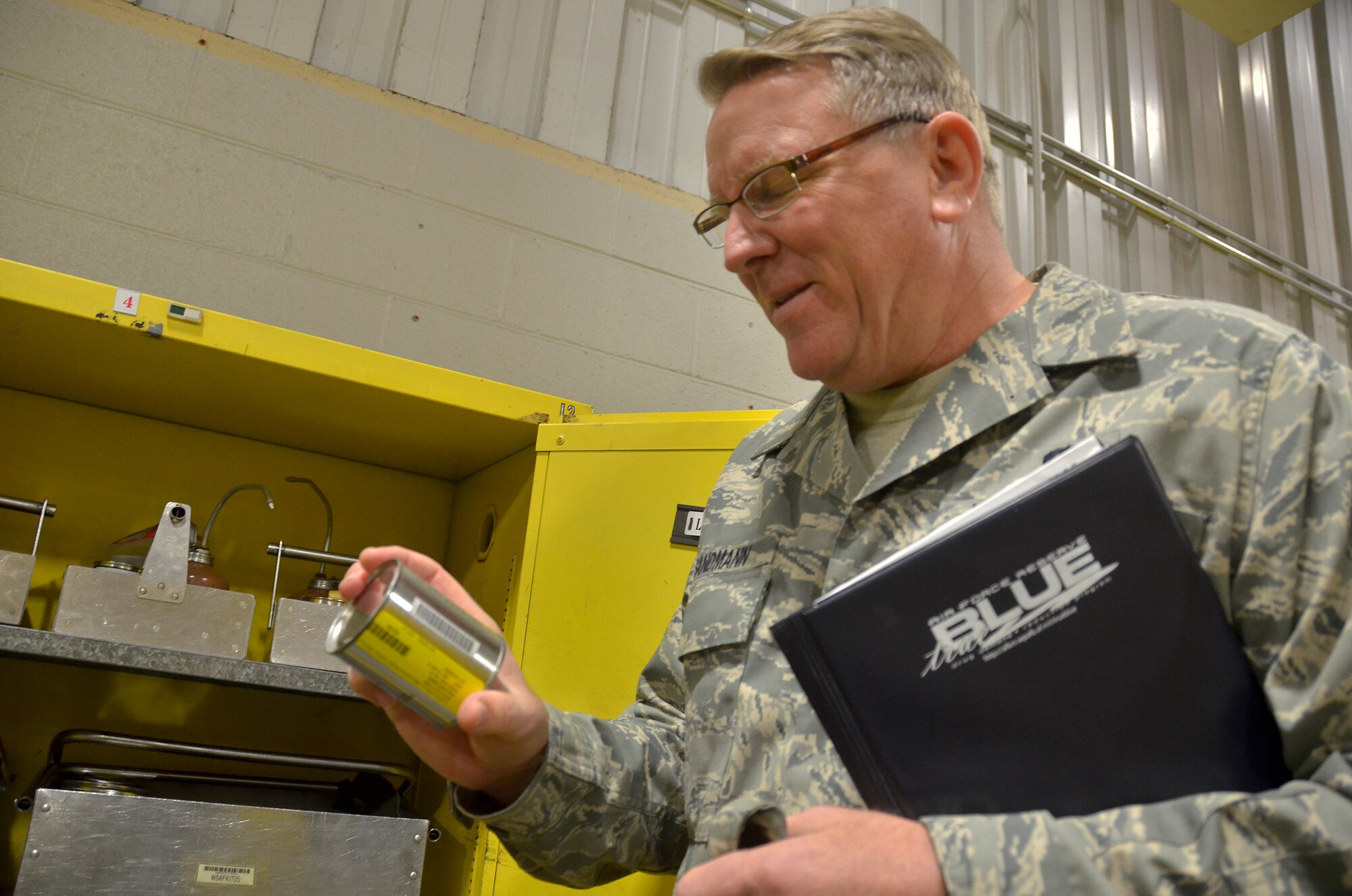 WRIGHT-PATTERSON AIR FORCE BASE, Ohio - Staff Sgt. Steven Sandmann, 445th Airlift Wing Ground Safety, performs a follow-up inspection in the 445th Aerospace Ground Equipment Facility Nov. 16. The wing safety office is the wing/base commander's program for overall safety. It usually entails something new from day-to-day and working with a diverse group of people. (U.S. Air Force photo/Staff Sgt. Amanda Duncan)