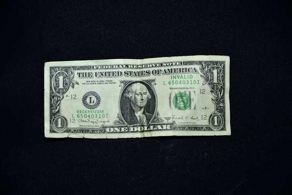 Turkish wedding dollars, similar in appearance to U.S. $1 bills, are tossed at weddings over people who are dancing. The tossing of the dollars is part of a tradition where guests would toss the money over dancing people as a form of payment to the musician. (U.S. Air Force photo by Staff Sgt. Eric Summers Jr./Released)