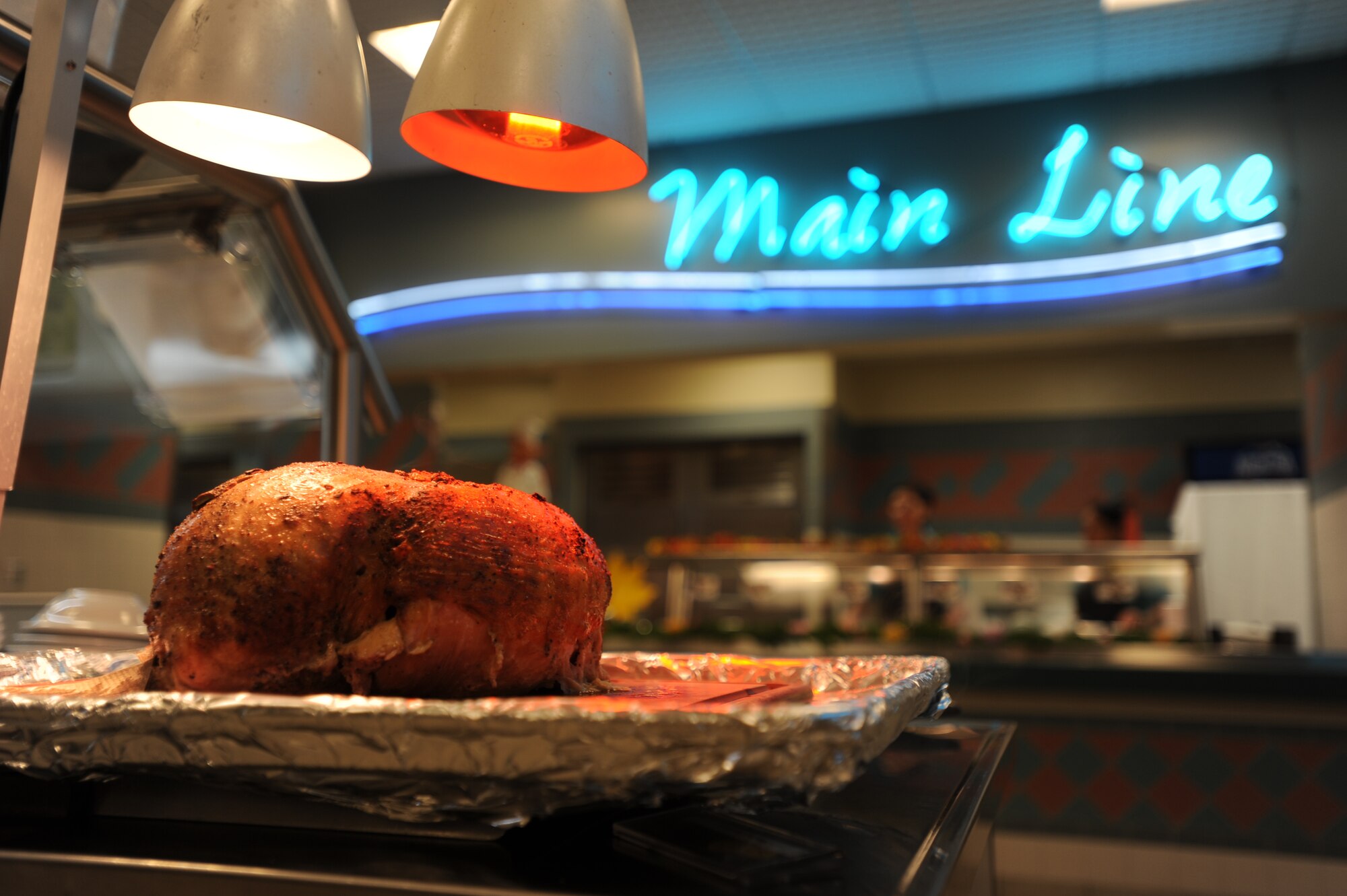 A turkey sits in the Riptide Dining Facility during a Thanksgiving meal on Hurlburt Field, Fla., Nov. 28, 2013. A slice of turkey is one first food items Riptide patrons had the option to receive during their dining experience. (U.S. Air Force photo/Senior Airman Kentavist P. Brackin)