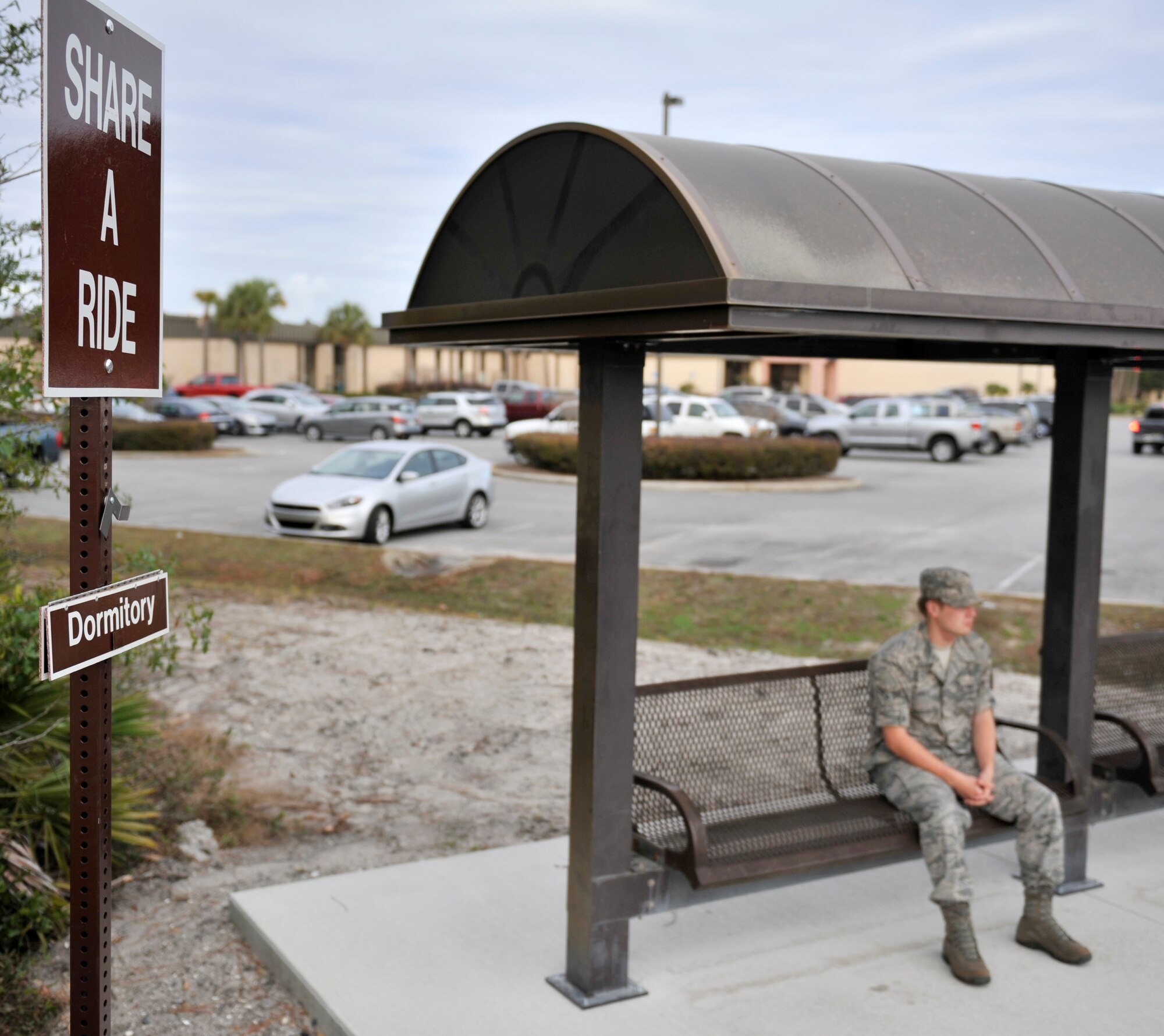 An Airman waits for a ride outside the 1st Special Operations Medical Group
on Hurlburt Field, Fla., Dec. 3, 2013. The Share a Ride program was recently
established to help Airman without vehicles get to various places across the
base. (U.S. Air Force photo/Airman 1st Class Jeff Parkinson)
