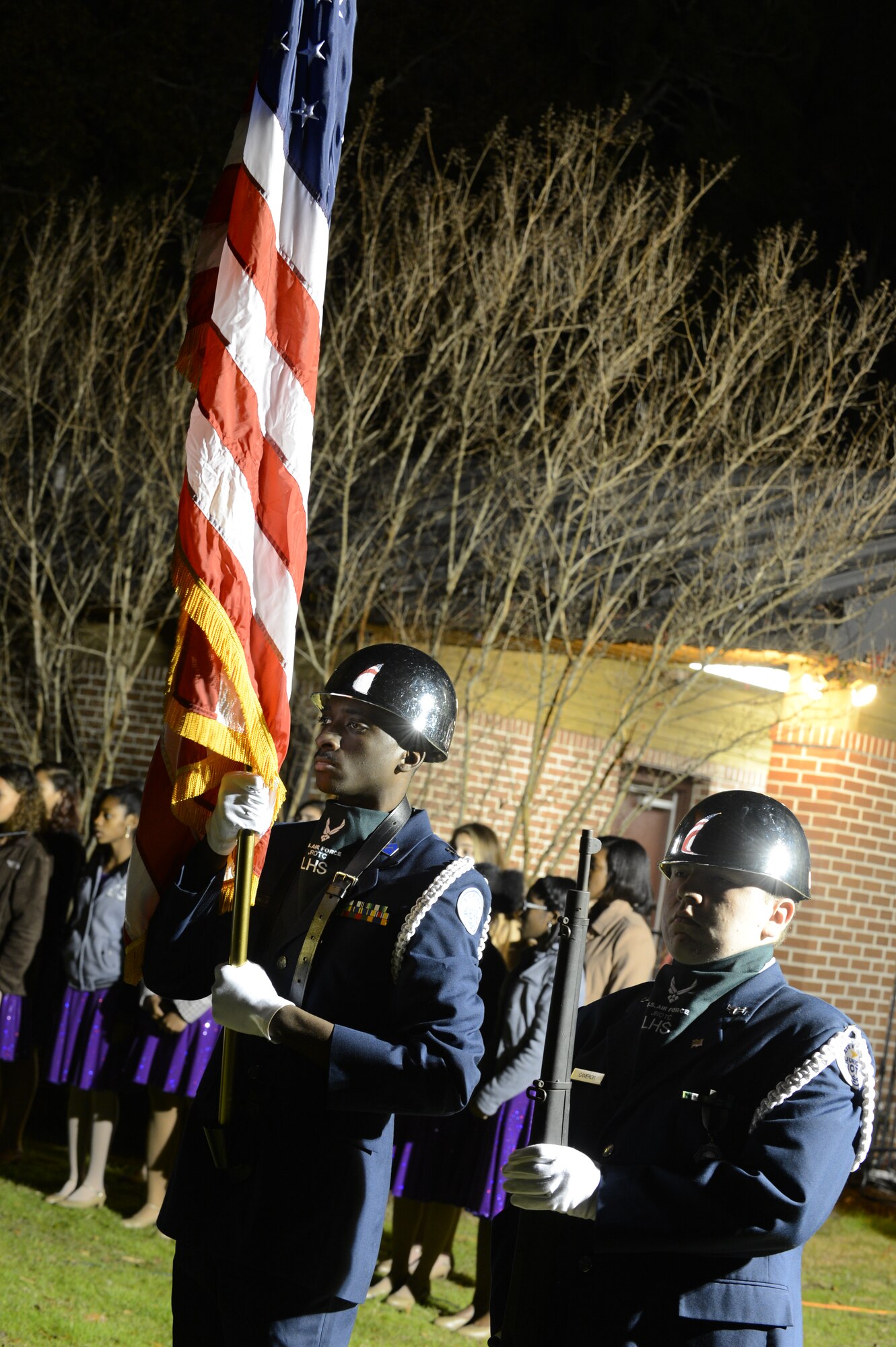 U.S. Air Force Junior ROTC cadets from Lakewood High School provide the posting of the colors during the Fantasy of Lights event at Swan Lake Iris Gardens, Sumter, S.C., Dec. 1, 2013. Cadets helped make the events opening ceremony complete as the national anthem played. (U.S. Air Force photo by Tech. Sgt. Frank Miller/Released)