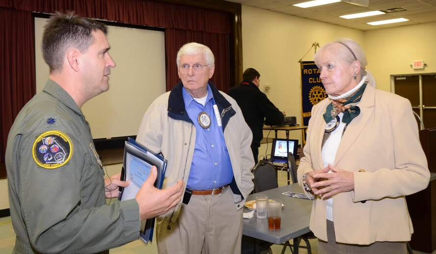 U.S Air Force Lt. Col. John Verhage, 116th Operations Group deputy commander, Georgia Air National Guard, talks with members of the Warner Robins Rotary Club, Warner Robins, Ga., Dec. 3, 2013. Verhage and members of the 116th ACW Public Affairs office visited the Rotary Club during the Georgia National Guard Podium Week to share about the mission and successes of the Joint STARS 116th ACW and the Georgia National Guard. (U.S. Air National Guard photo by Tech. Sgt. Regina Young/Released)