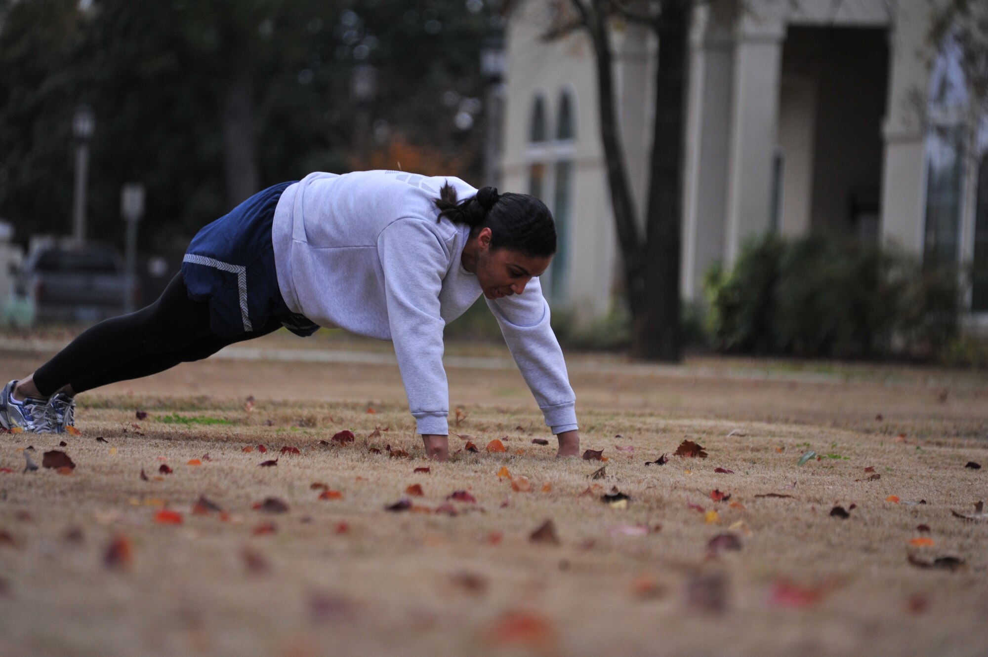 Master Sgt. Naomi Bullock, 42nd Medical Group, does pushups during a physical training session while attending the Senior NCO Professional Development Seminar at Maxwell Air Force Base, Nov. 21. The seminar is designed to harness the leadership tools they’ve learned thus far in their Air Force careers so they can then help others advance in their careers. (U.S. Air Force photo by Airman 1st Class William Blankenship)