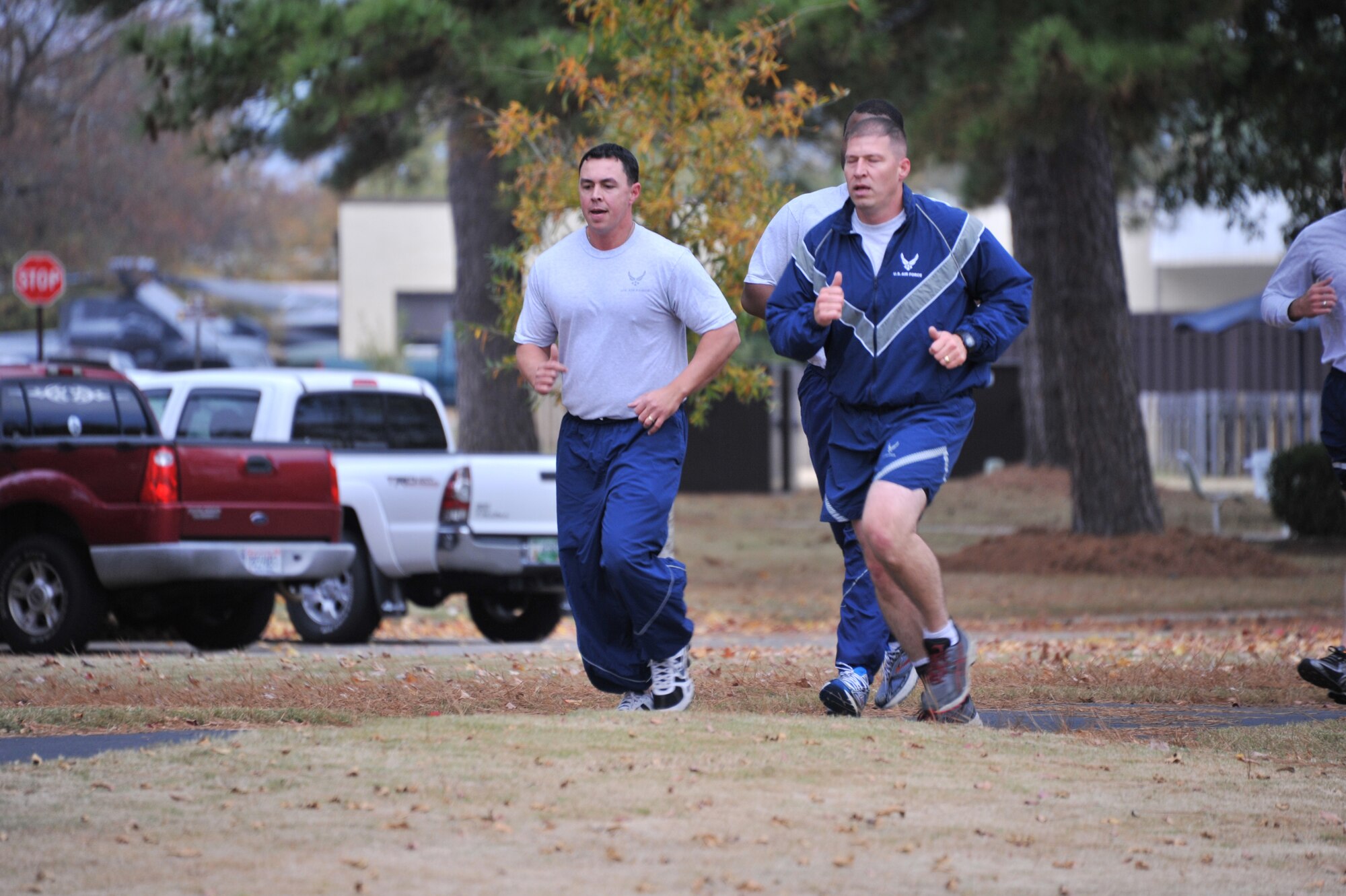 Tech. Sgt. Steven Pierce Jr. and Master Sgt. Shane Merillar, both from Air Force Legal Operation Agency and attending the Senior NCO Professional Development Seminar, run during a physical training session at Maxwell Air Force Base, Nov. 21. The annual course also serves as the lead up to the senior NCO induction ceremony. (U.S. Air Force photo by Airman 1st Class William Blankenship)
